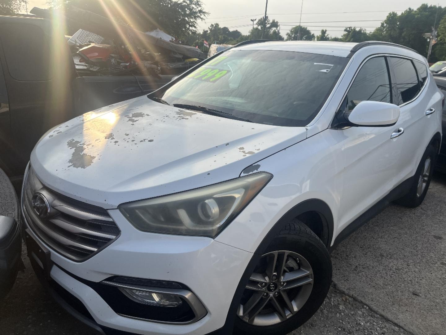 2017 WHITE HYUNDAI SANTA FE Sport 2.4 FWD (5NMZU3LB0HH) with an 2.4L L4 DOHC 16V engine, AUTOMATIC transmission, located at 2303 West Mt. Houston, Houston, 77038, (281) 507-3956, 29.771597, -95.339569 - Photo#1