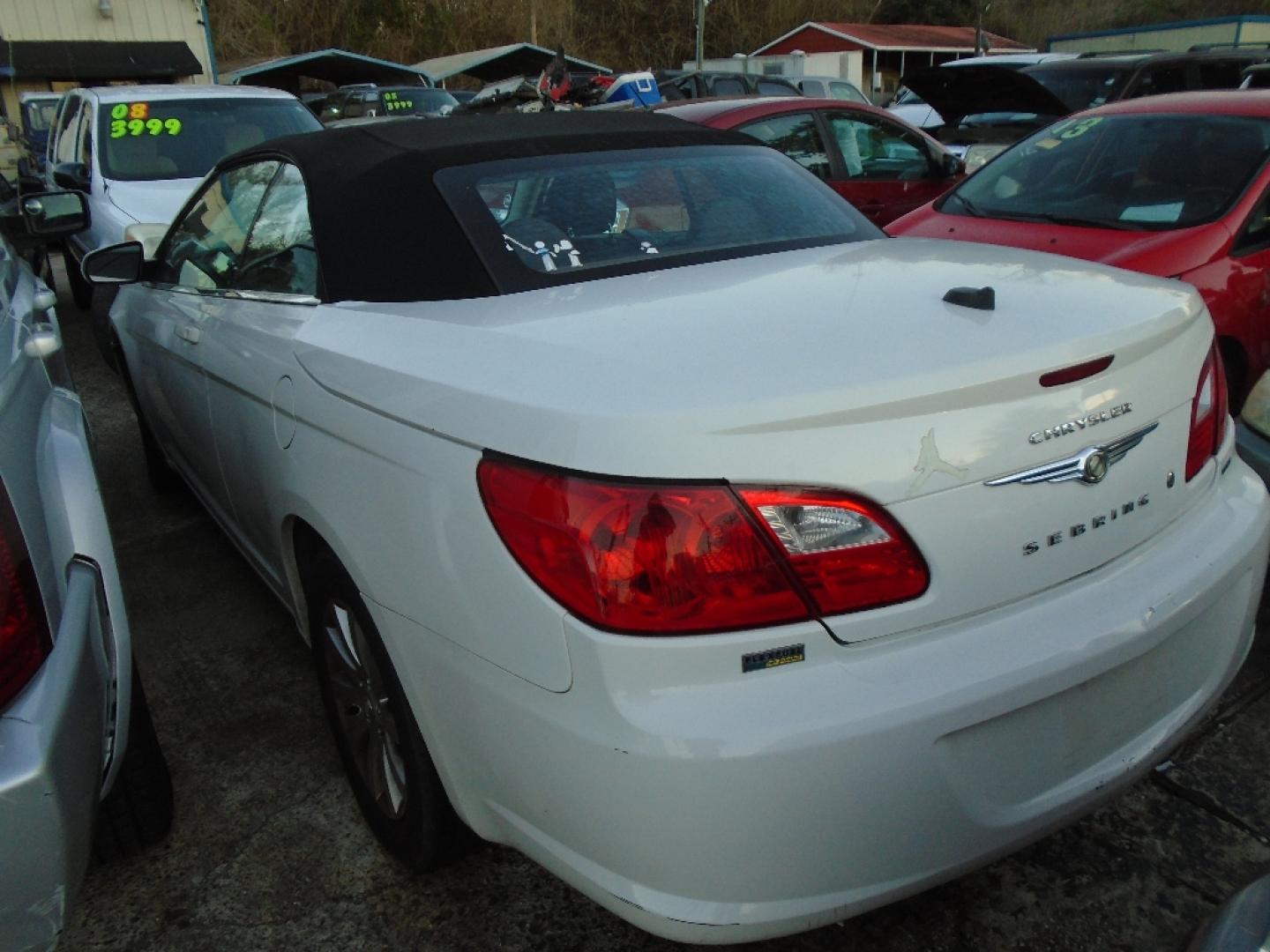 2010 WHITE CHRYSLER SEBRING Convertible Touring (1C3BC5ED1AN) with an 2.7L V6 DOHC 24V FFV engine, AUTOMATIC transmission, located at 2303 West Mt. Houston, Houston, 77038, (281) 507-3956, 29.771597, -95.339569- Photo#1