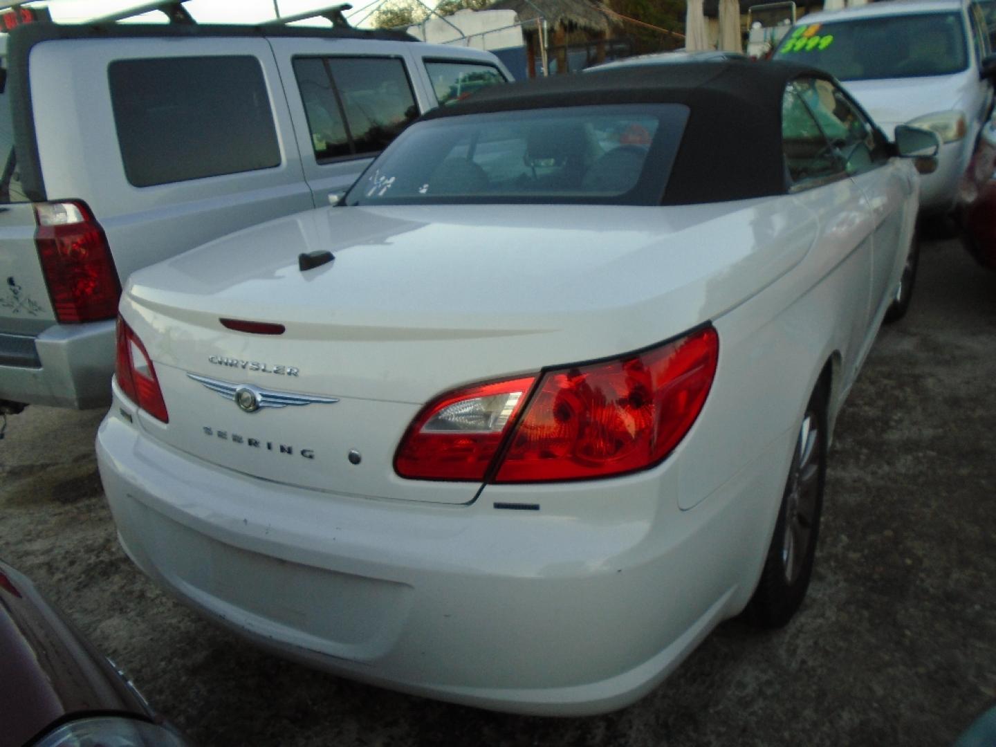 2010 WHITE CHRYSLER SEBRING Convertible Touring (1C3BC5ED1AN) with an 2.7L V6 DOHC 24V FFV engine, AUTOMATIC transmission, located at 2303 West Mt. Houston, Houston, 77038, (281) 507-3956, 29.771597, -95.339569- Photo#2