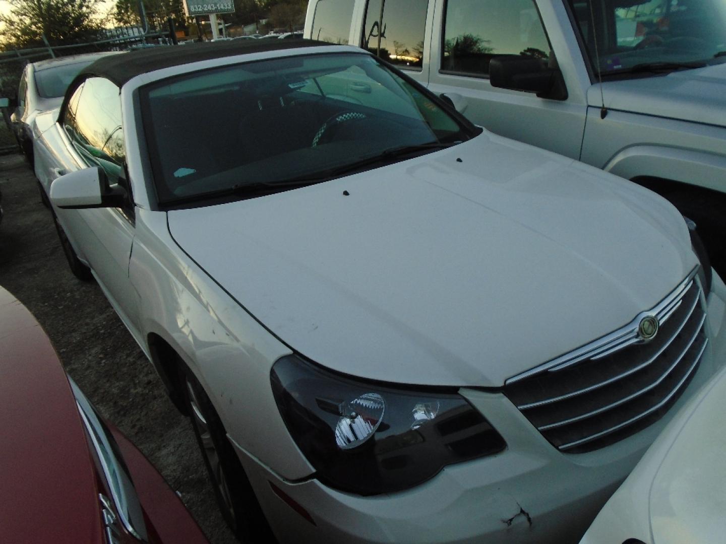 2010 WHITE CHRYSLER SEBRING Convertible Touring (1C3BC5ED1AN) with an 2.7L V6 DOHC 24V FFV engine, AUTOMATIC transmission, located at 2303 West Mt. Houston, Houston, 77038, (281) 507-3956, 29.771597, -95.339569- Photo#3