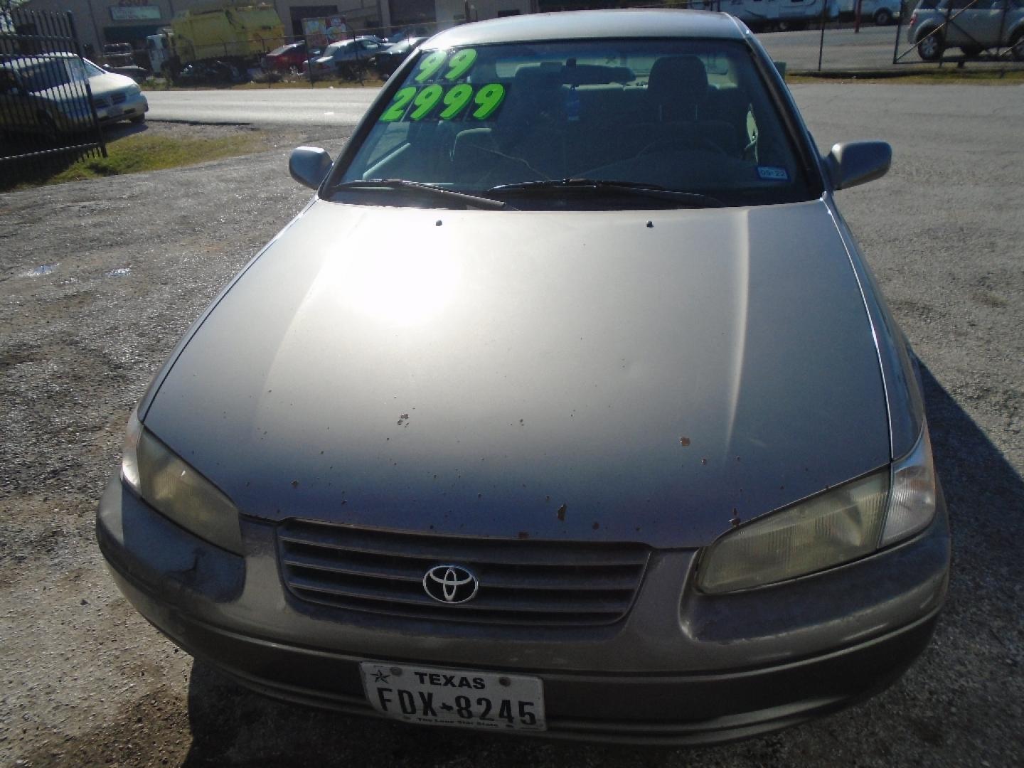 1999 TAN TOYOTA CAMRY CE (4T1BG22K8XU) with an 2.2L L4 DOHC 16V engine, AUTOMATIC transmission, located at 2303 West Mt. Houston, Houston, 77038, (281) 507-3956, 29.771597, -95.339569- Photo#1
