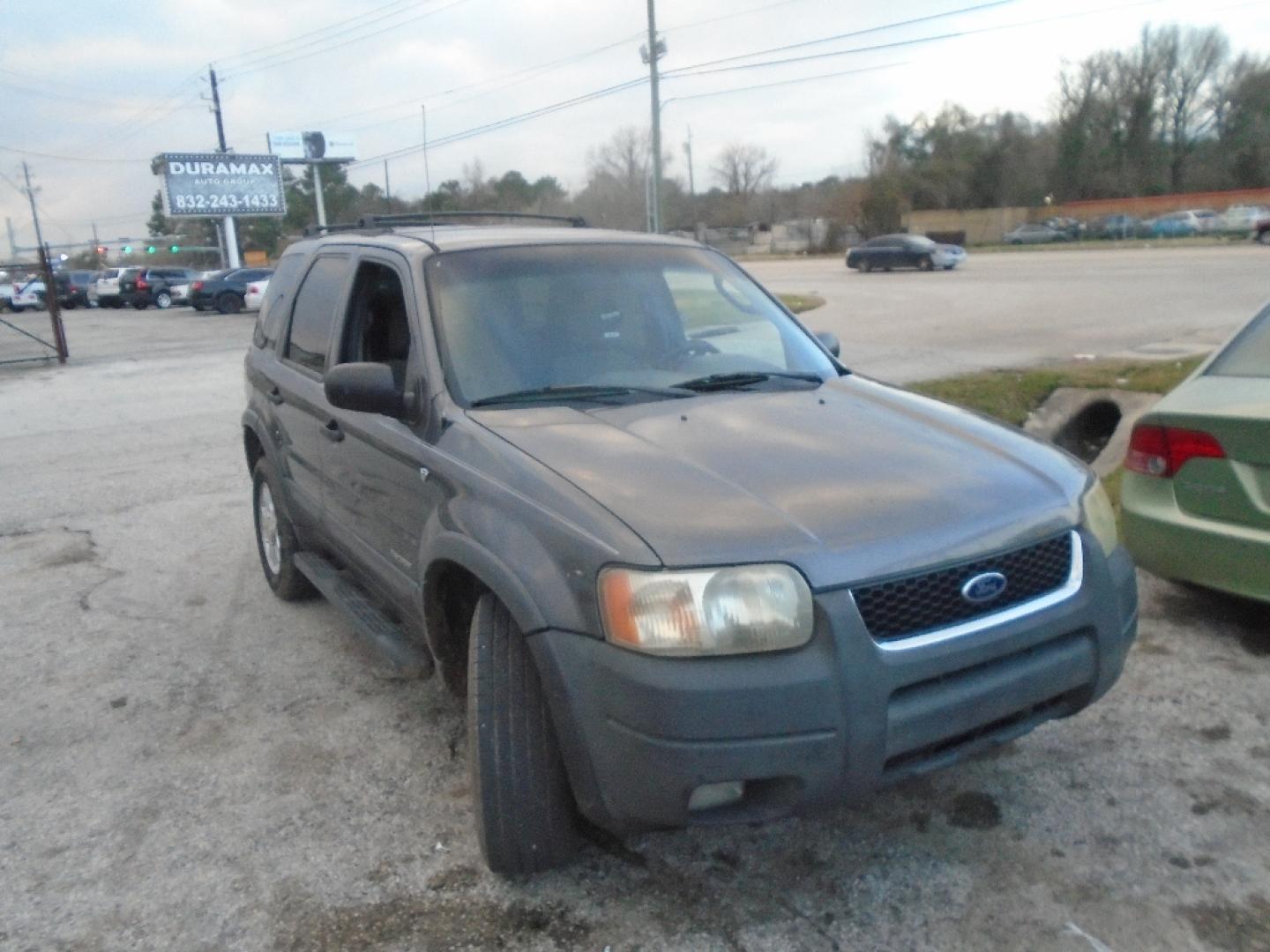 2002 GRAY FORD ESCAPE XLT Choice 2WD (1FMYU03162K) with an 3.0L V6 DOHC 24V engine, AUTOMATIC transmission, located at 2303 West Mt. Houston, Houston, 77038, (281) 507-3956, 29.771597, -95.339569- Photo#0