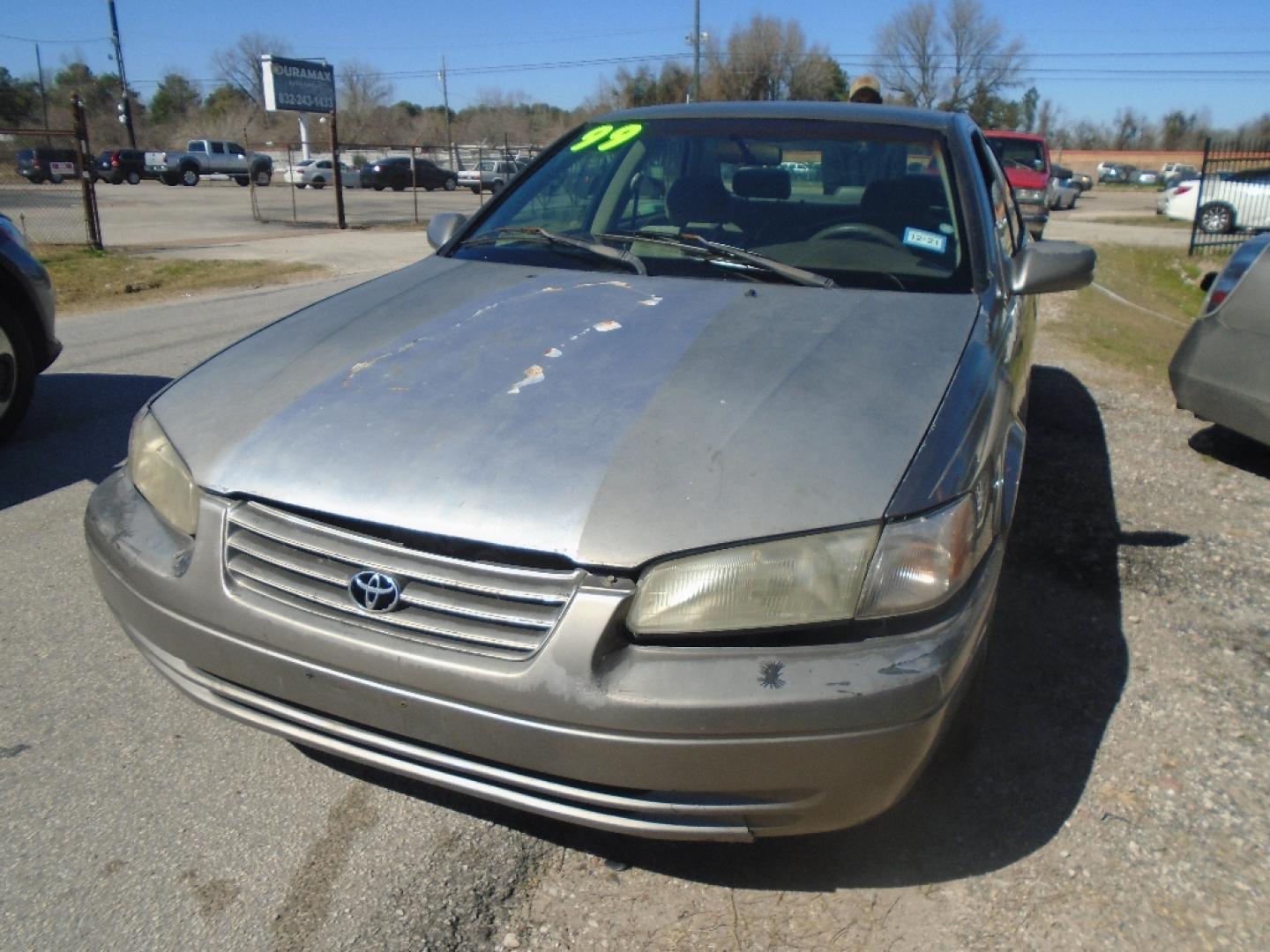 1999 TAN TOYOTA CAMRY CE (4T1BG22K9XU) with an 2.2L L4 DOHC 16V engine, AUTOMATIC transmission, located at 2303 West Mt. Houston, Houston, 77038, (281) 507-3956, 29.771597, -95.339569- Photo#0