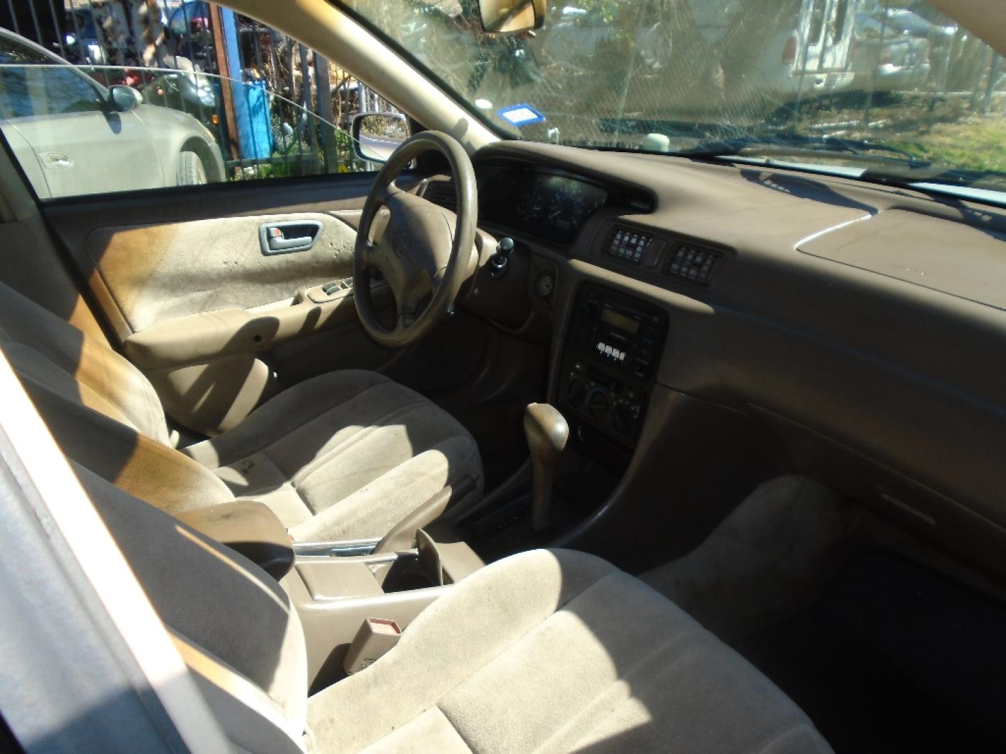 1999 TAN TOYOTA CAMRY CE (4T1BG22K9XU) with an 2.2L L4 DOHC 16V engine, AUTOMATIC transmission, located at 2303 West Mt. Houston, Houston, 77038, (281) 507-3956, 29.771597, -95.339569- Photo#5