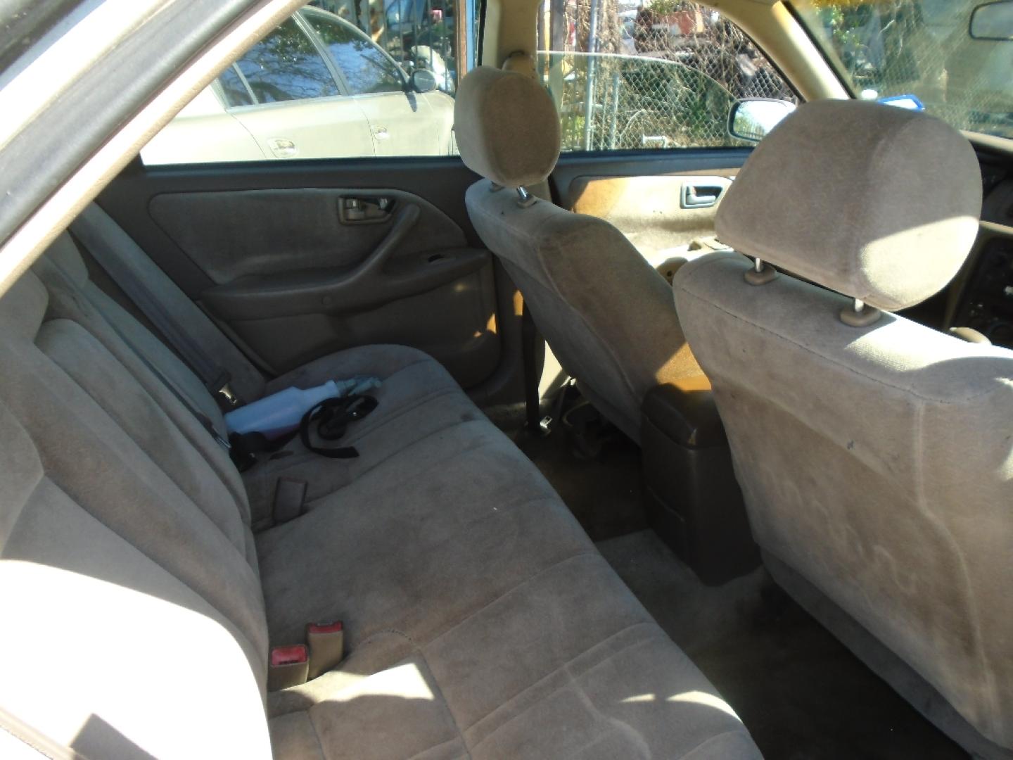 1999 TAN TOYOTA CAMRY CE (4T1BG22K9XU) with an 2.2L L4 DOHC 16V engine, AUTOMATIC transmission, located at 2303 West Mt. Houston, Houston, 77038, (281) 507-3956, 29.771597, -95.339569- Photo#6