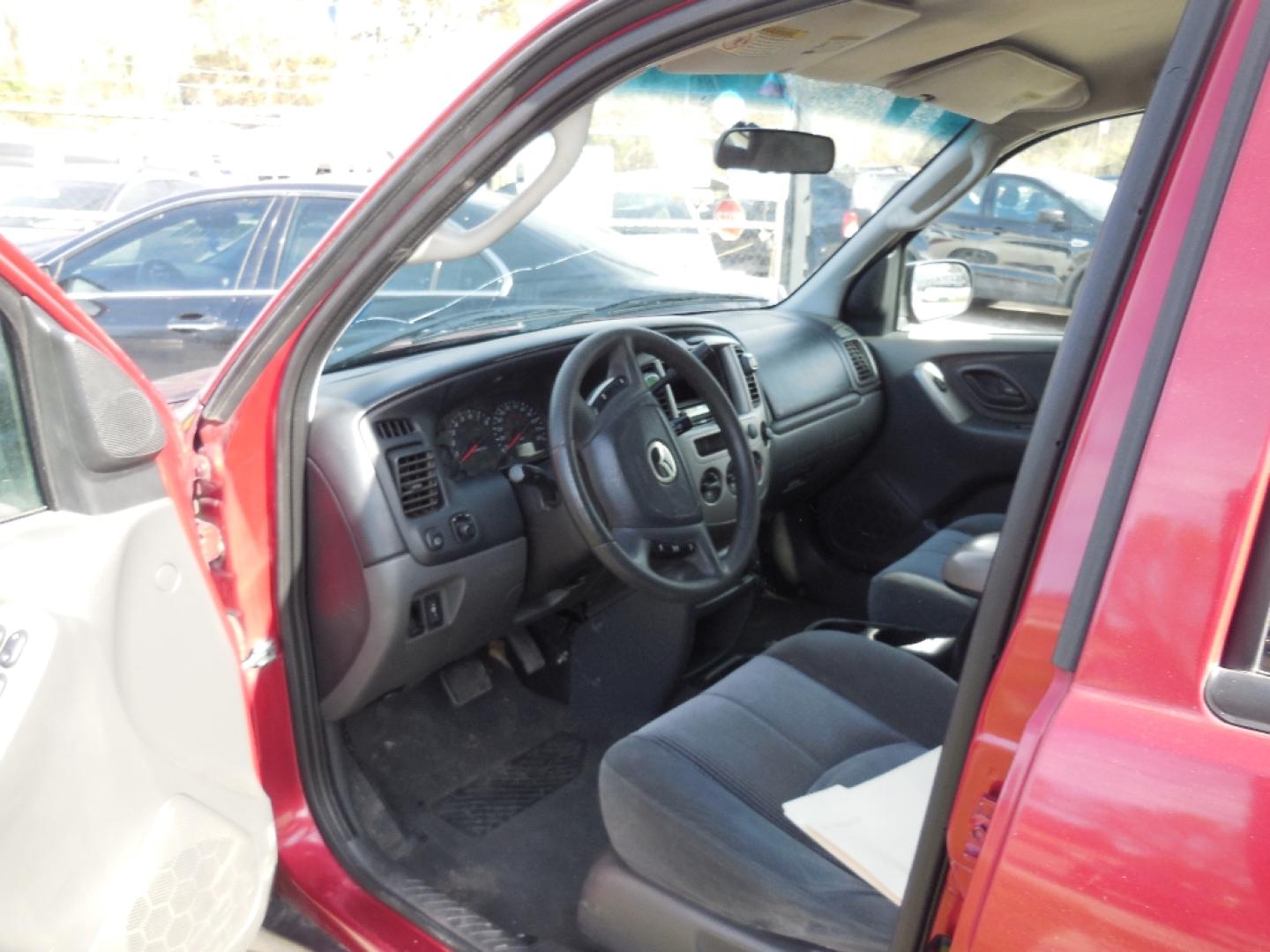 2003 RED MAZDA TRIBUTE LX (4F2YZ04153K) with an 3.0L V6 DOHC 24V engine, AUTOMATIC transmission, located at 2303 West Mt. Houston, Houston, 77038, (281) 507-3956, 29.771597, -95.339569- Photo#1