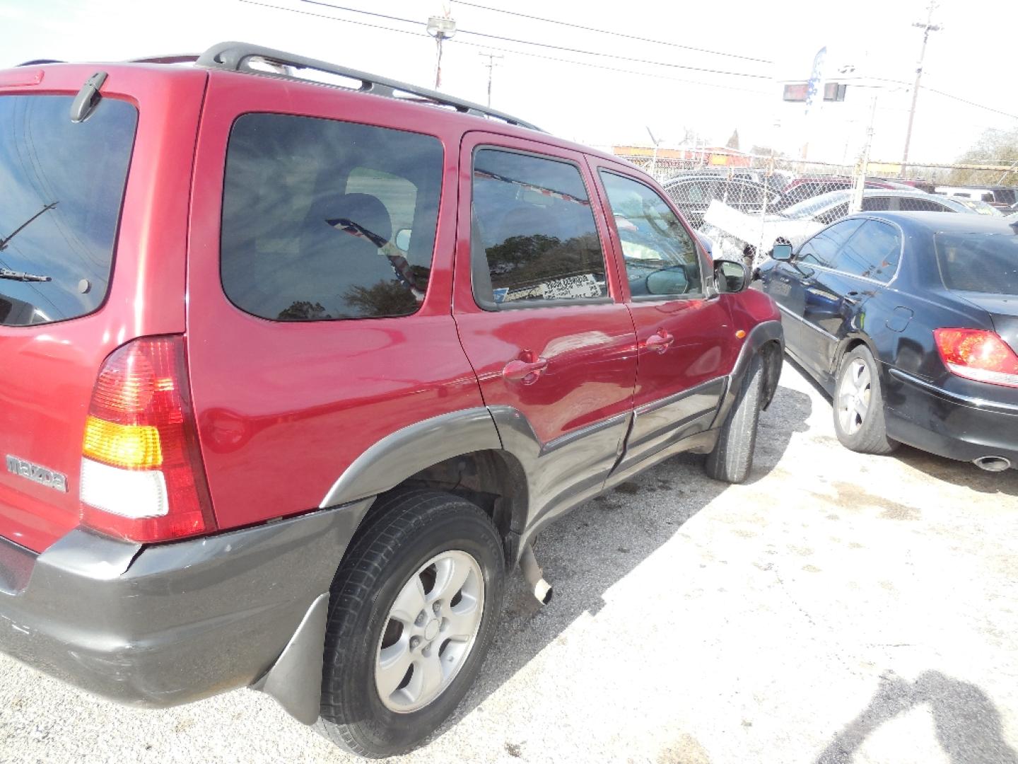 2003 RED MAZDA TRIBUTE LX (4F2YZ04153K) with an 3.0L V6 DOHC 24V engine, AUTOMATIC transmission, located at 2303 West Mt. Houston, Houston, 77038, (281) 507-3956, 29.771597, -95.339569- Photo#2