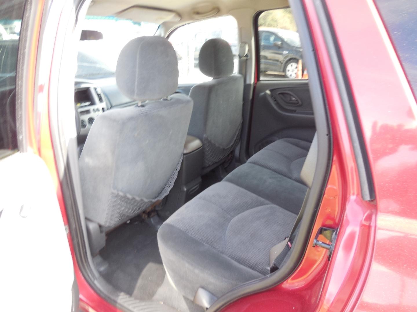 2003 RED MAZDA TRIBUTE LX (4F2YZ04153K) with an 3.0L V6 DOHC 24V engine, AUTOMATIC transmission, located at 2303 West Mt. Houston, Houston, 77038, (281) 507-3956, 29.771597, -95.339569- Photo#4