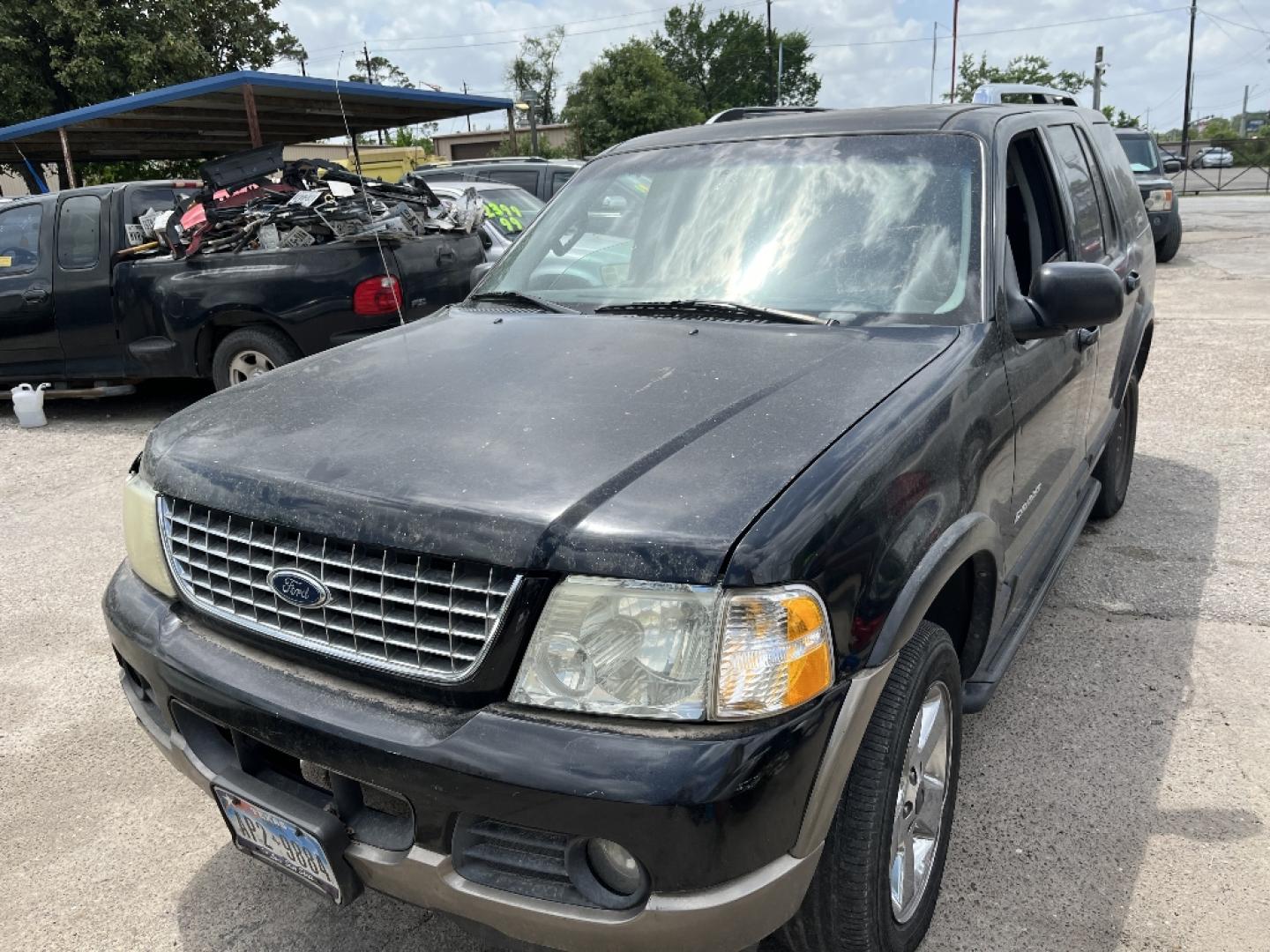 2004 BLACK FORD EXPLORER Limited 4.0L 2WD (1FMZU65K34U) with an 4.0L V6 SOHC 12V FFV engine, AUTOMATIC transmission, located at 2303 West Mt. Houston, Houston, 77038, (281) 507-3956, 29.771597, -95.339569- Photo#0