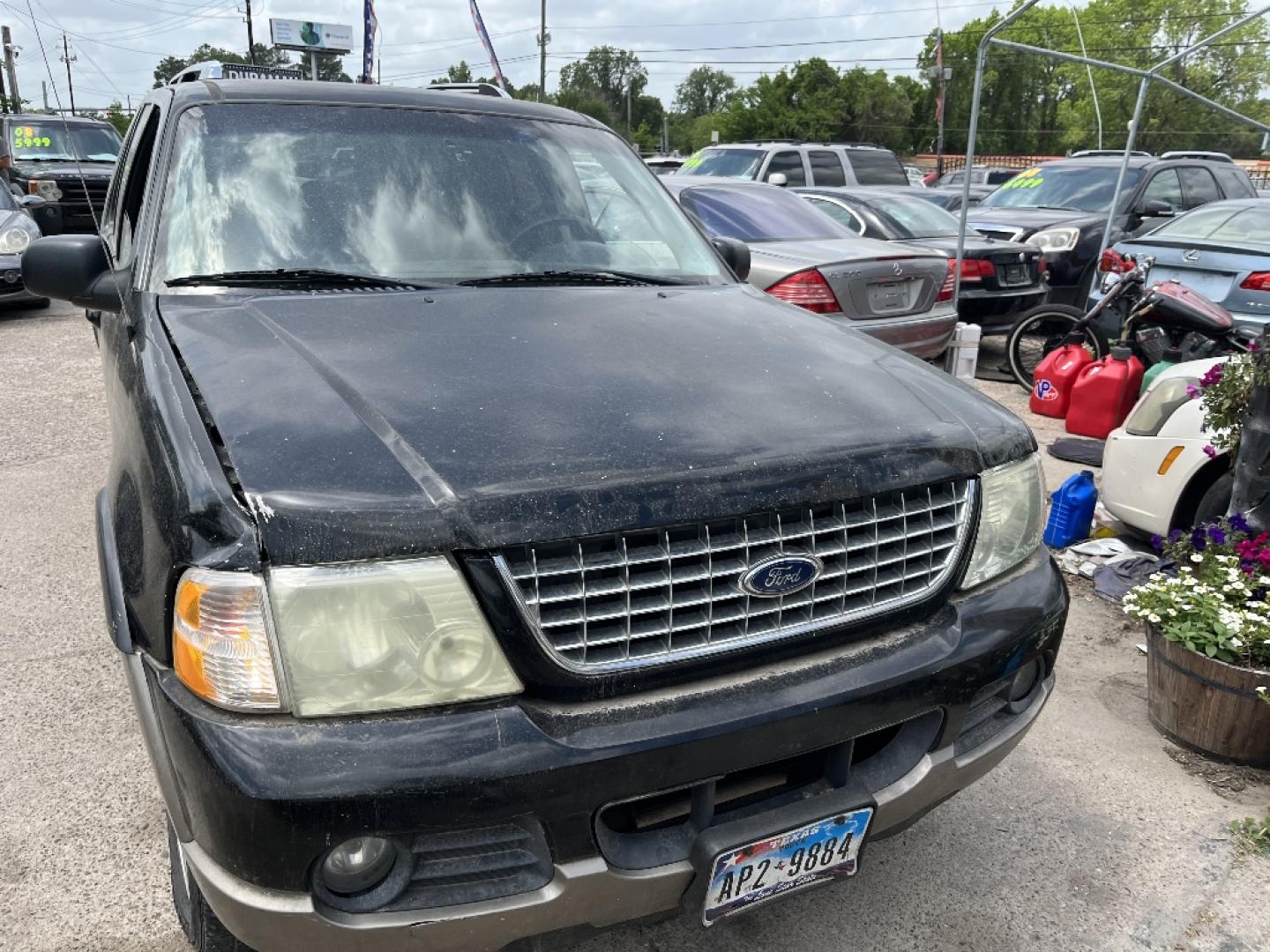 2004 BLACK FORD EXPLORER Limited 4.0L 2WD (1FMZU65K34U) with an 4.0L V6 SOHC 12V FFV engine, AUTOMATIC transmission, located at 2303 West Mt. Houston, Houston, 77038, (281) 507-3956, 29.771597, -95.339569- Photo#1