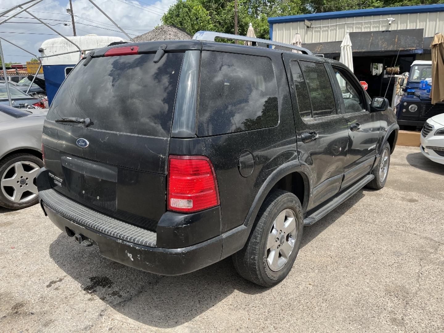 2004 BLACK FORD EXPLORER Limited 4.0L 2WD (1FMZU65K34U) with an 4.0L V6 SOHC 12V FFV engine, AUTOMATIC transmission, located at 2303 West Mt. Houston, Houston, 77038, (281) 507-3956, 29.771597, -95.339569- Photo#2