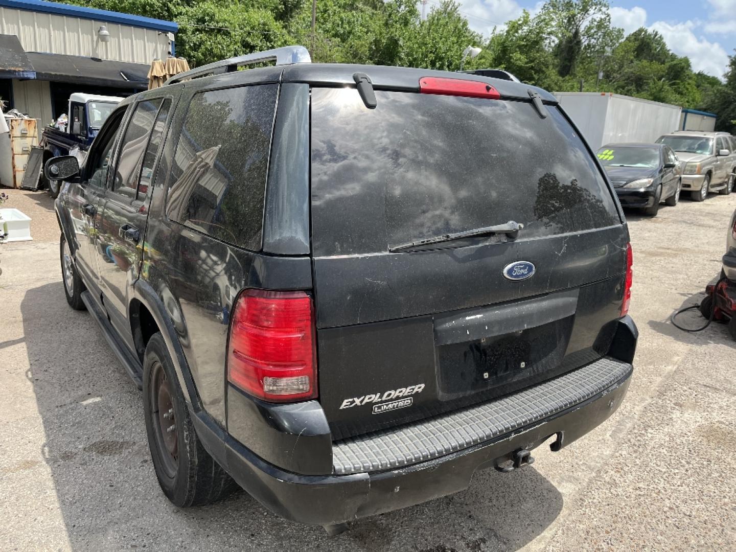 2004 BLACK FORD EXPLORER Limited 4.0L 2WD (1FMZU65K34U) with an 4.0L V6 SOHC 12V FFV engine, AUTOMATIC transmission, located at 2303 West Mt. Houston, Houston, 77038, (281) 507-3956, 29.771597, -95.339569- Photo#3
