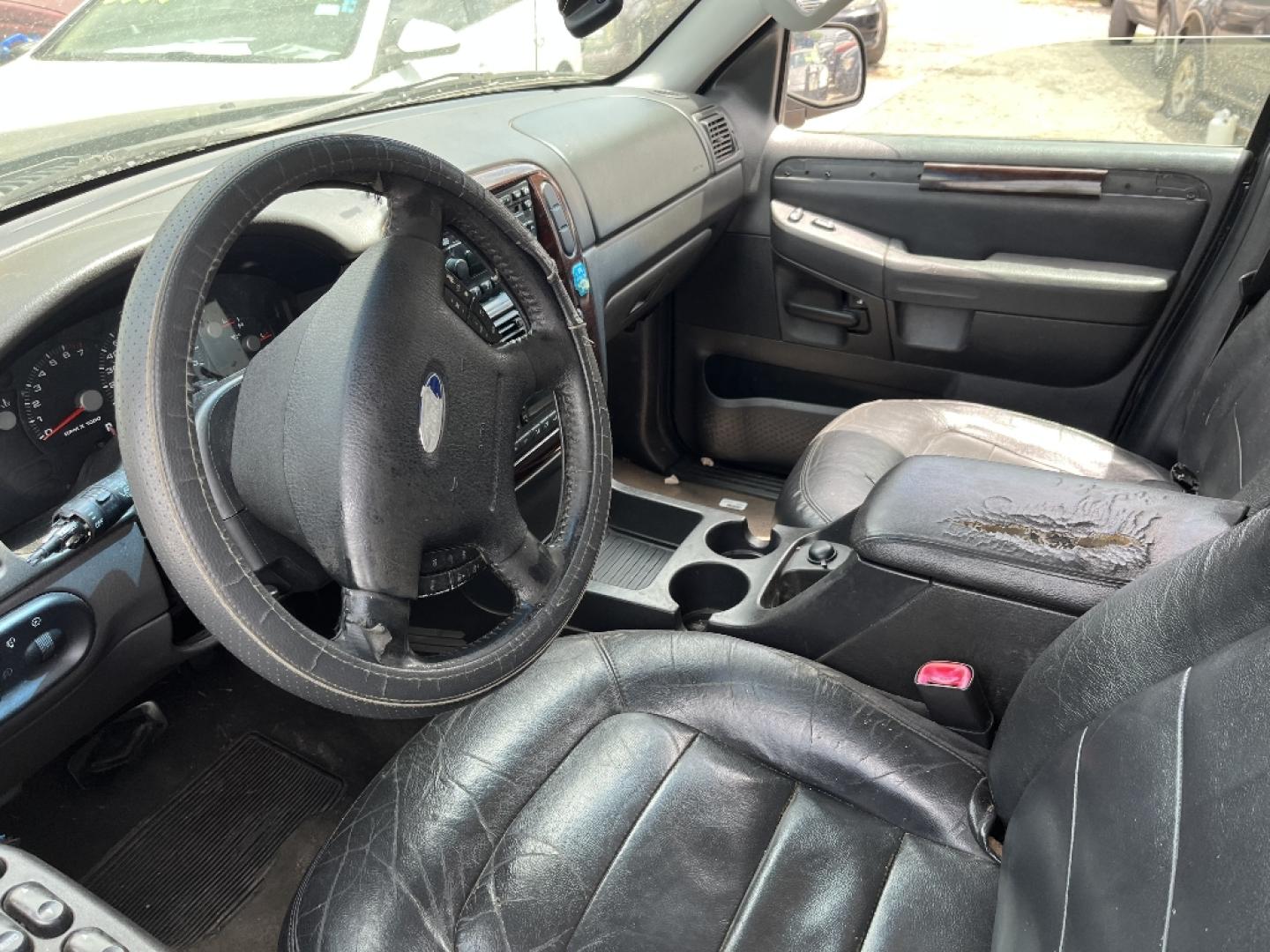 2004 BLACK FORD EXPLORER Limited 4.0L 2WD (1FMZU65K34U) with an 4.0L V6 SOHC 12V FFV engine, AUTOMATIC transmission, located at 2303 West Mt. Houston, Houston, 77038, (281) 507-3956, 29.771597, -95.339569- Photo#4