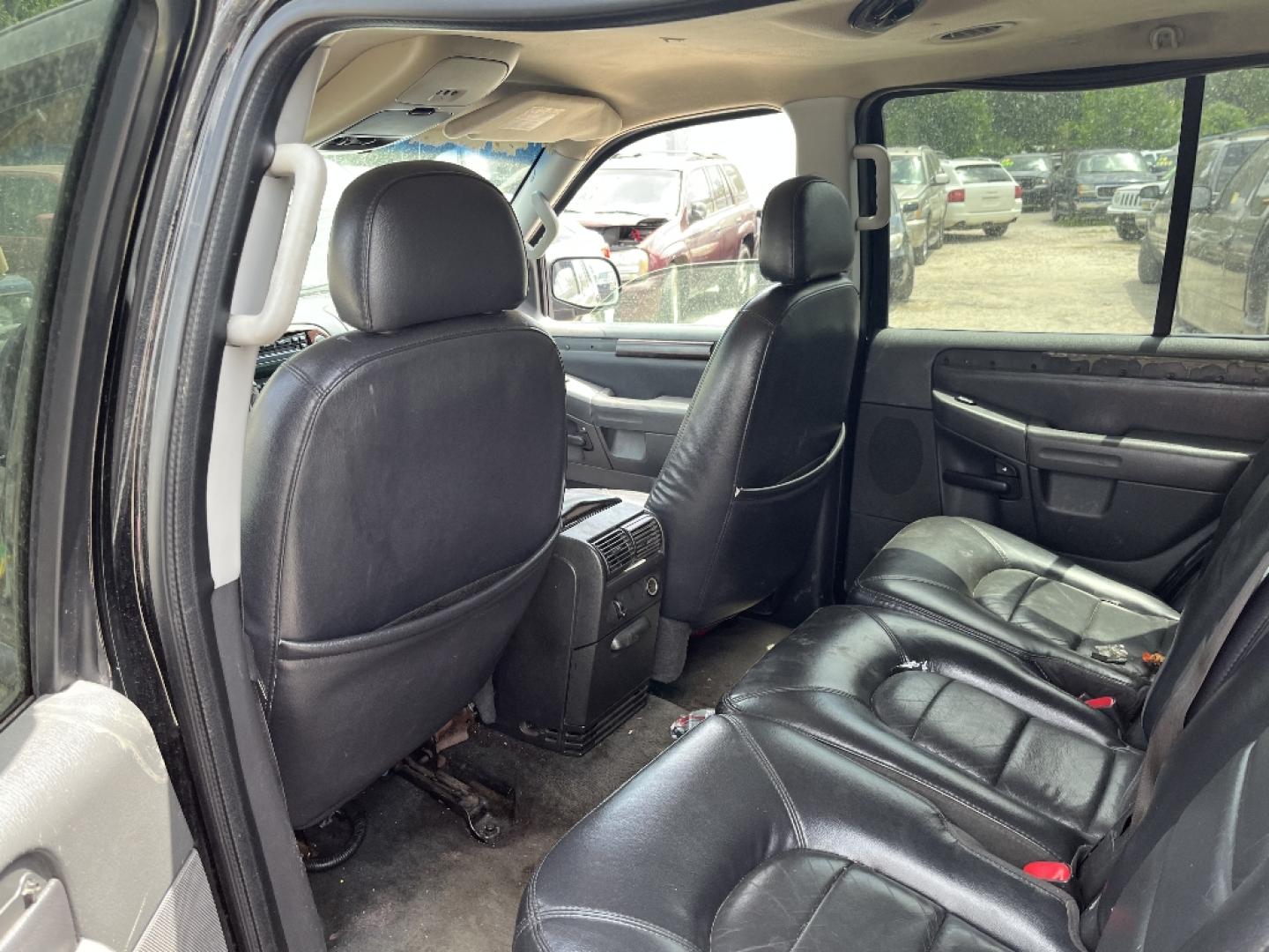 2004 BLACK FORD EXPLORER Limited 4.0L 2WD (1FMZU65K34U) with an 4.0L V6 SOHC 12V FFV engine, AUTOMATIC transmission, located at 2303 West Mt. Houston, Houston, 77038, (281) 507-3956, 29.771597, -95.339569- Photo#5
