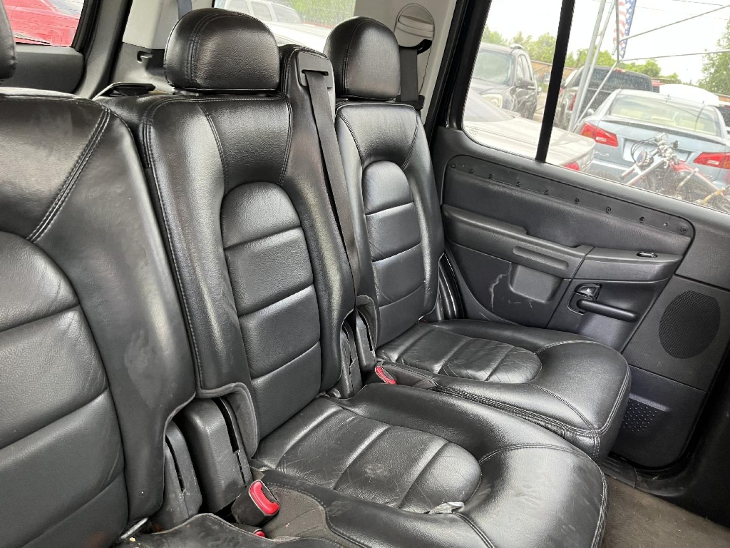 2004 BLACK FORD EXPLORER Limited 4.0L 2WD (1FMZU65K34U) with an 4.0L V6 SOHC 12V FFV engine, AUTOMATIC transmission, located at 2303 West Mt. Houston, Houston, 77038, (281) 507-3956, 29.771597, -95.339569- Photo#6