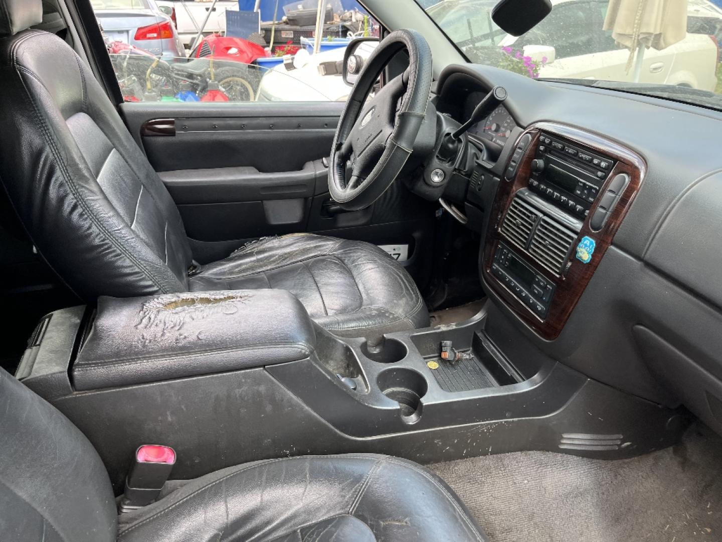 2004 BLACK FORD EXPLORER Limited 4.0L 2WD (1FMZU65K34U) with an 4.0L V6 SOHC 12V FFV engine, AUTOMATIC transmission, located at 2303 West Mt. Houston, Houston, 77038, (281) 507-3956, 29.771597, -95.339569- Photo#7
