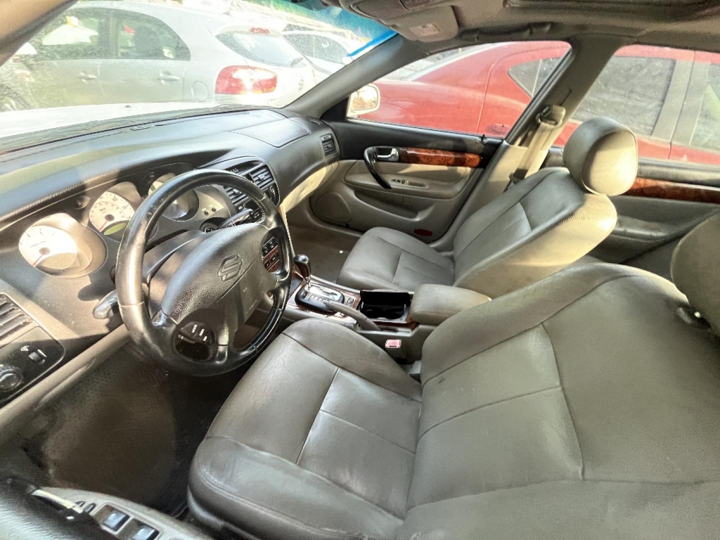2005 WHITE SUZUKI VERONA EX (KL5VM56L15B) with an 2.5L L6 DOHC 24V engine, AUTOMATIC transmission, located at 2303 West Mt. Houston, Houston, 77038, (281) 507-3956, 29.771597, -95.339569- Photo#4