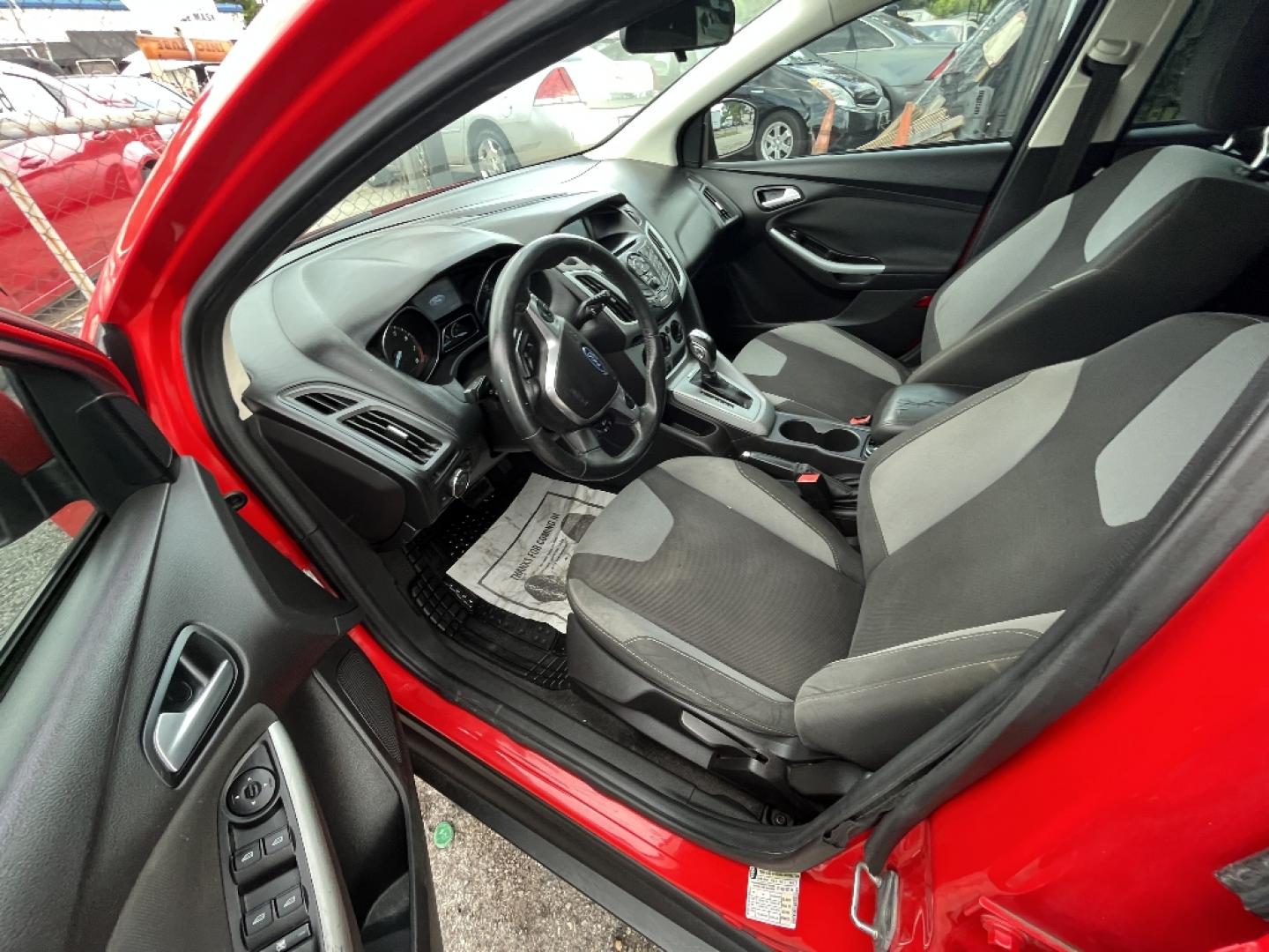 2012 RED FORD FOCUS SE (1FAHP3K25CL) with an 2.0L L4 DOHC 16V engine, AUTOMATIC transmission, located at 2303 West Mt. Houston, Houston, 77038, (281) 507-3956, 29.771597, -95.339569- Photo#3