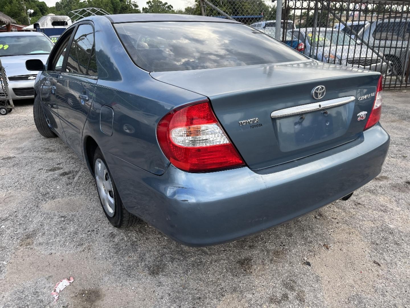 2003 BLUE TOYOTA CAMRY LE (4T1BE30K03U) with an 2.4L L4 DOHC 16V engine, AUTOMATIC transmission, located at 2303 West Mt. Houston, Houston, 77038, (281) 507-3956, 29.771597, -95.339569- Photo#4