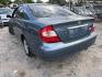 2003 BLUE TOYOTA CAMRY LE (4T1BE30K03U) with an 2.4L L4 DOHC 16V engine, AUTOMATIC transmission, located at 2303 West Mt. Houston, Houston, 77038, (281) 507-3956, 29.771597, -95.339569- Photo#4
