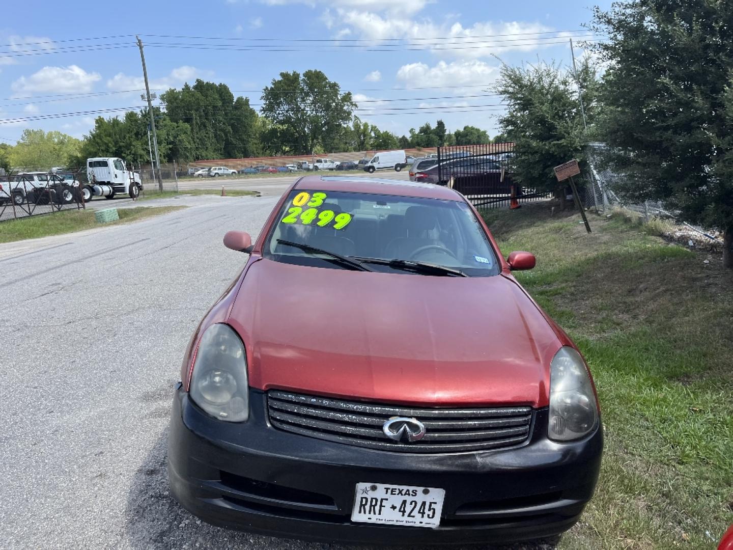 2003 RED INFINITI G35 Sport Sedan (JNKCV51E23M) with an 3.5L V6 DOHC 24V engine, AUTOMATIC transmission, located at 2303 West Mt. Houston, Houston, 77038, (281) 507-3956, 29.771597, -95.339569- Photo#0