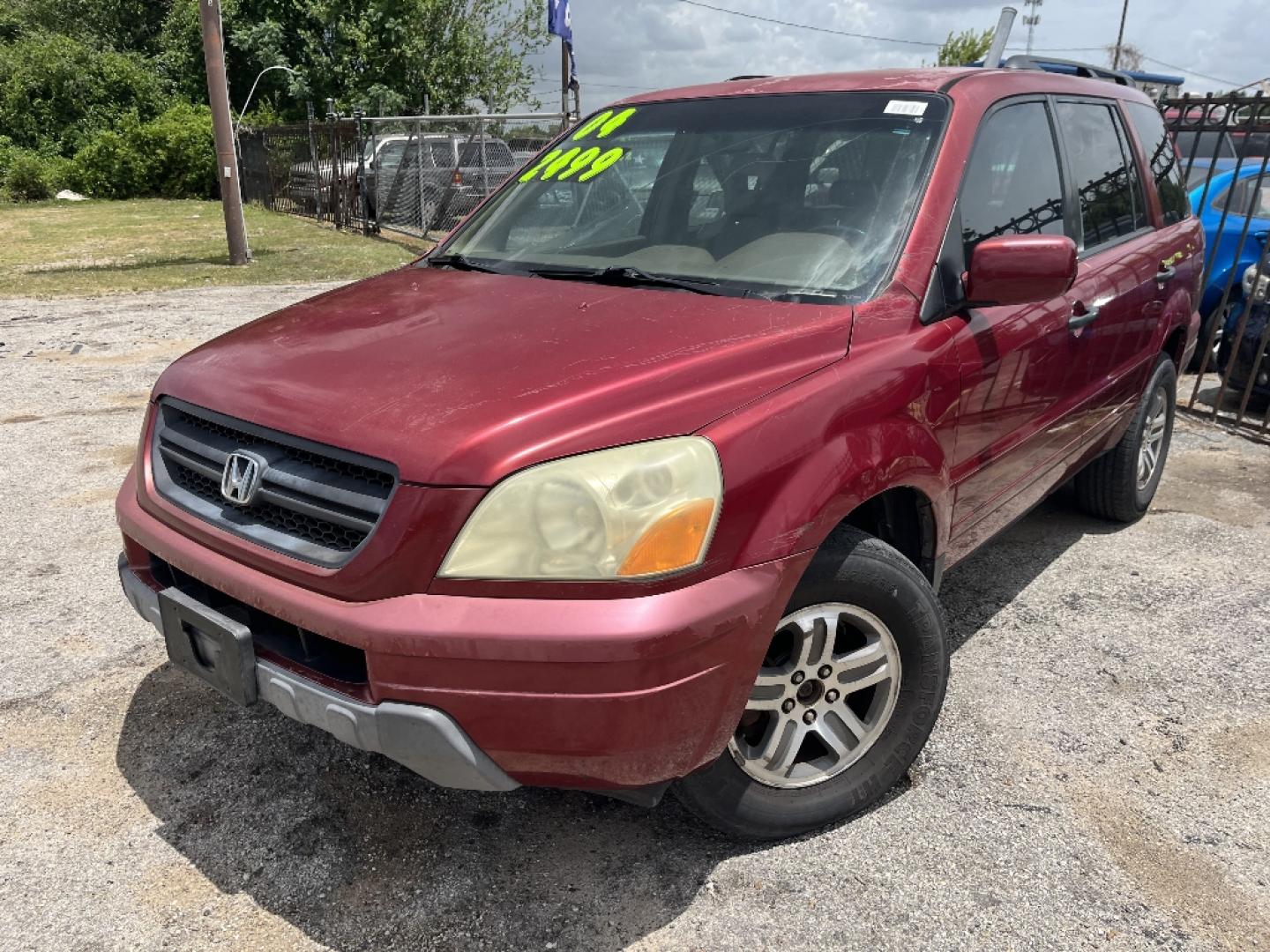 2004 RED HONDA PILOT EX w/ Leather (2HKYF18584H) with an 3.5L V6 SOHC 24V engine, AUTOMATIC transmission, located at 2303 West Mt. Houston, Houston, 77038, (281) 507-3956, 29.771597, -95.339569- Photo#0