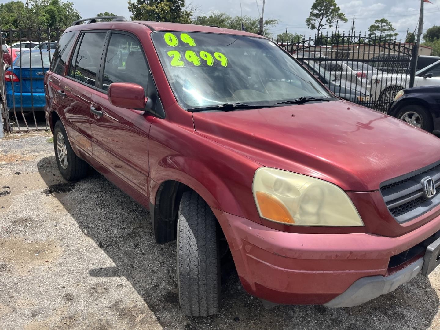 2004 RED HONDA PILOT EX w/ Leather (2HKYF18584H) with an 3.5L V6 SOHC 24V engine, AUTOMATIC transmission, located at 2303 West Mt. Houston, Houston, 77038, (281) 507-3956, 29.771597, -95.339569- Photo#1