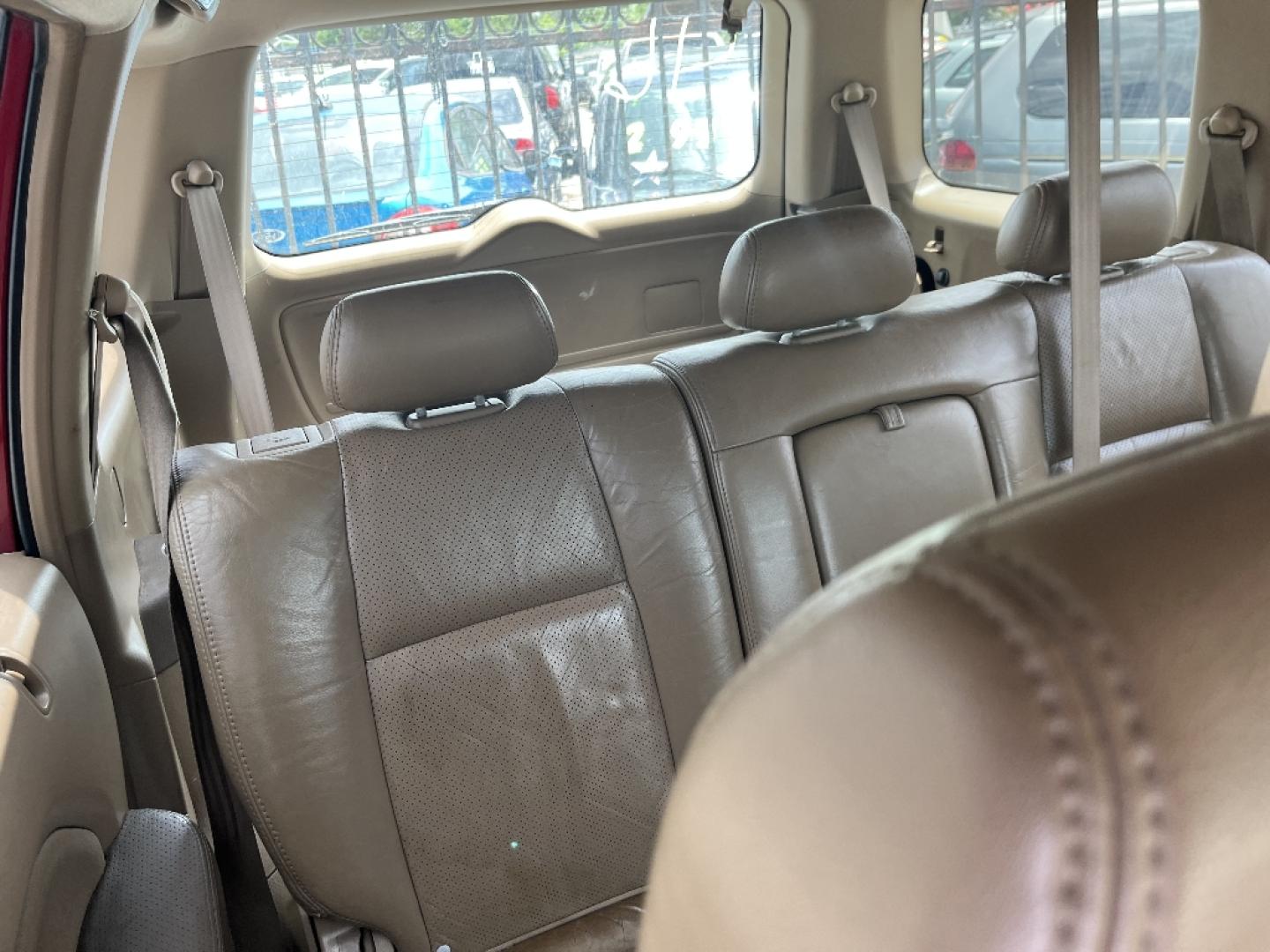2004 RED HONDA PILOT EX w/ Leather (2HKYF18584H) with an 3.5L V6 SOHC 24V engine, AUTOMATIC transmission, located at 2303 West Mt. Houston, Houston, 77038, (281) 507-3956, 29.771597, -95.339569- Photo#3