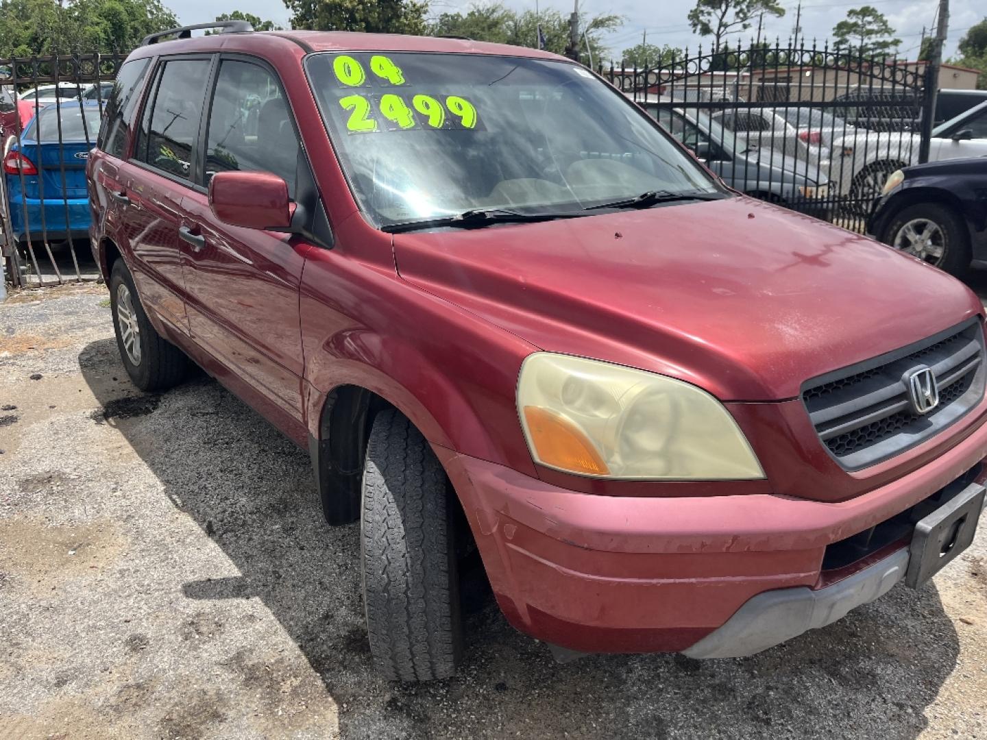 2004 RED HONDA PILOT EX w/ Leather (2HKYF18584H) with an 3.5L V6 SOHC 24V engine, AUTOMATIC transmission, located at 2303 West Mt. Houston, Houston, 77038, (281) 507-3956, 29.771597, -95.339569- Photo#5