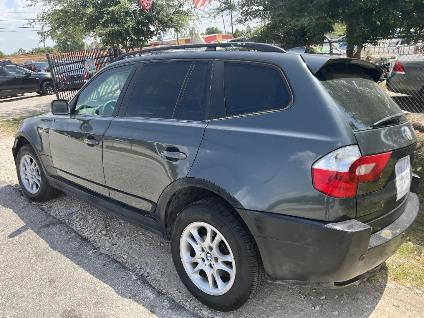 2004 GRAY BMW X3 2.5i (WBXPA73424W) with an 2.5L L6 DOHC 24V engine, AUTOMATIC transmission, located at 2303 West Mt. Houston, Houston, 77038, (281) 507-3956, 29.771597, -95.339569- Photo#2