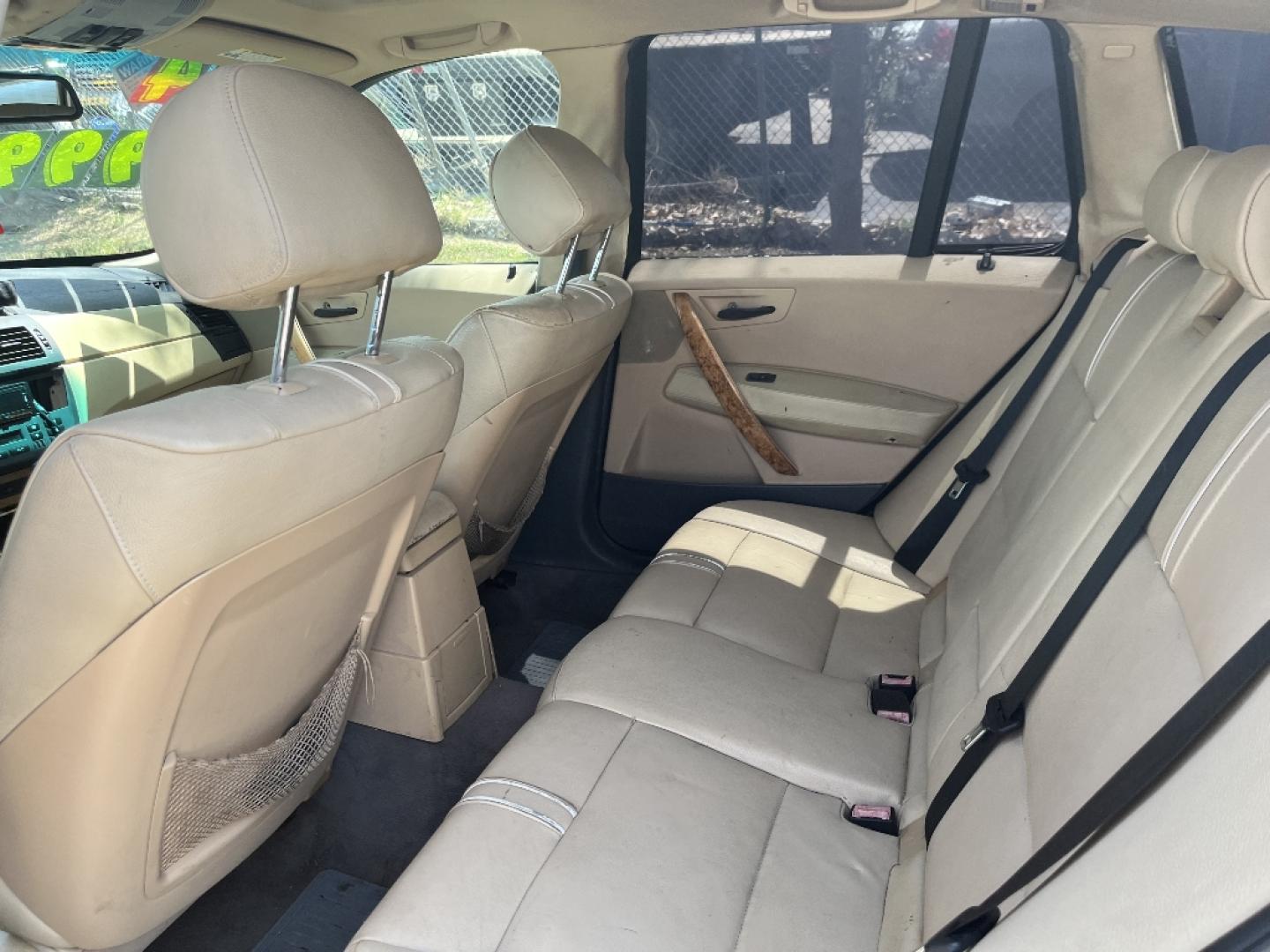 2004 GRAY BMW X3 2.5i (WBXPA73424W) with an 2.5L L6 DOHC 24V engine, AUTOMATIC transmission, located at 2303 West Mt. Houston, Houston, 77038, (281) 507-3956, 29.771597, -95.339569- Photo#5