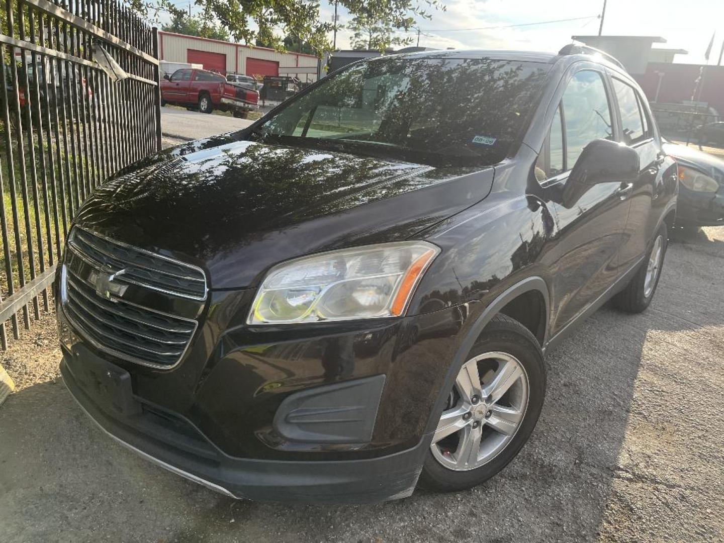 2015 MAROON CHEVROLET TRAX LT FWD (KL7CJLSB9FB) with an 1.4L L4 DOHC 16V engine, AUTOMATIC transmission, located at 2303 West Mt. Houston, Houston, 77038, (281) 507-3956, 29.771597, -95.339569 - Photo#0