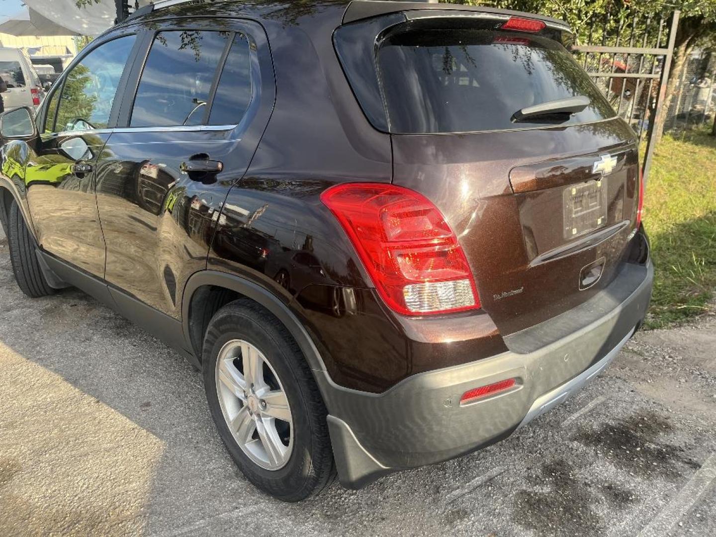 2015 MAROON CHEVROLET TRAX LT FWD (KL7CJLSB9FB) with an 1.4L L4 DOHC 16V engine, AUTOMATIC transmission, located at 2303 West Mt. Houston, Houston, 77038, (281) 507-3956, 29.771597, -95.339569 - Photo#1