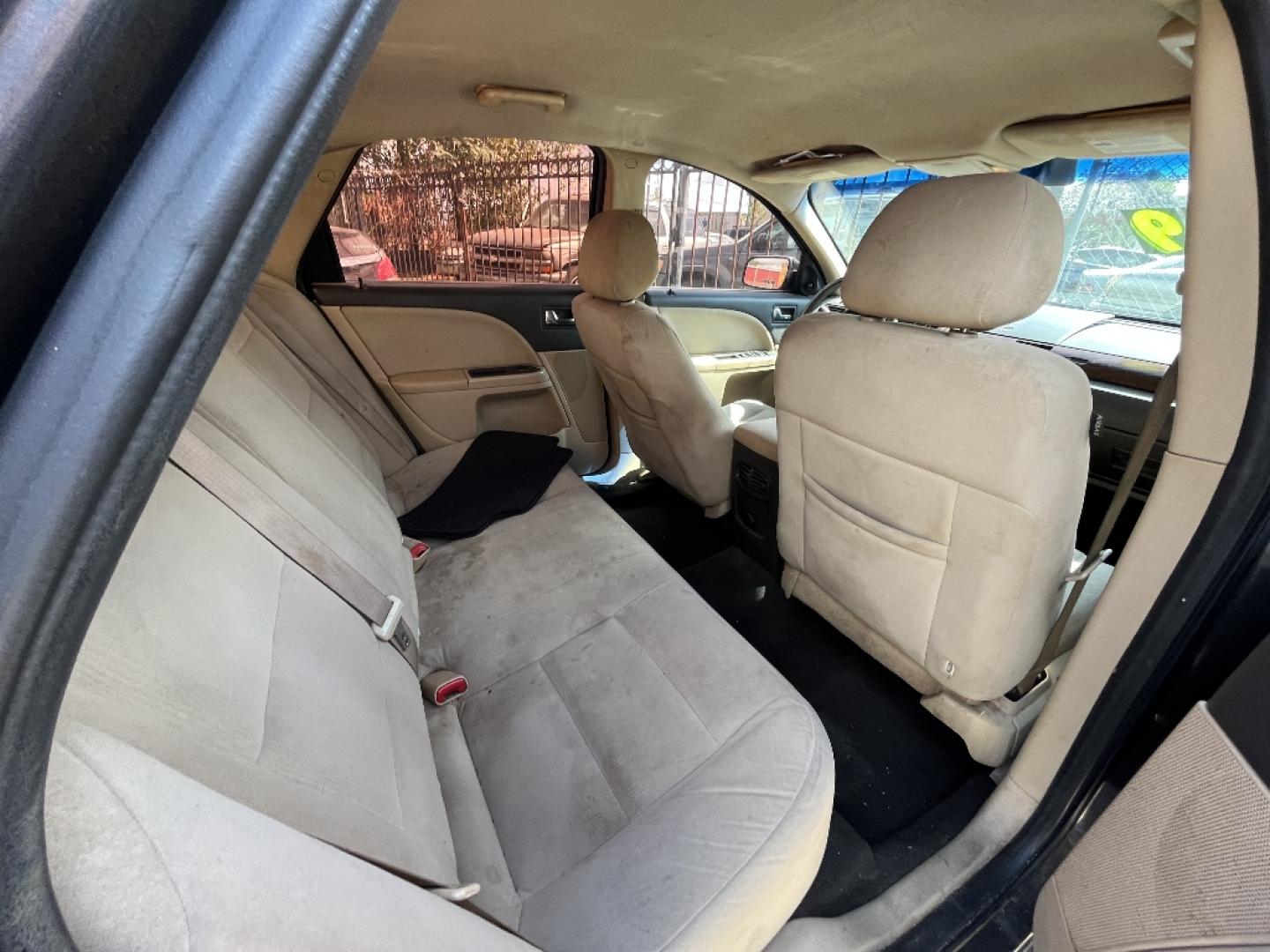 2008 BROWN FORD TAURUS SEL (1FAHP24W88G) with an 3.5L V6 DOHC 24V engine, AUTOMATIC transmission, located at 2303 West Mt. Houston, Houston, 77038, (281) 507-3956, 29.771597, -95.339569- Photo#3