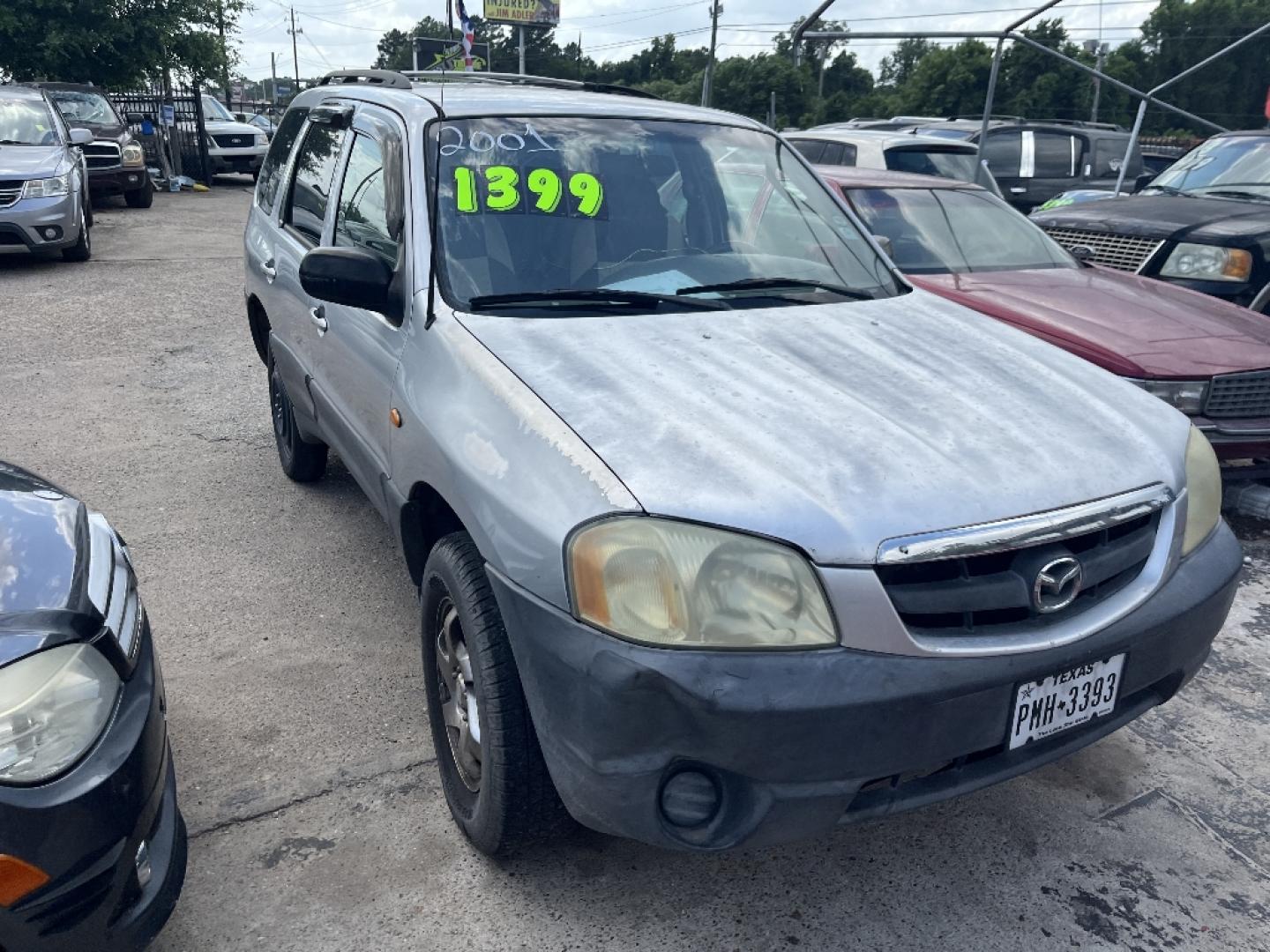 2001 BROWN MAZDA TRIBUTE DX (4F2YU07B11K) with an 2.0L L4 DOHC 16V engine, MANUAL transmission, located at 2303 West Mt. Houston, Houston, 77038, (281) 507-3956, 29.771597, -95.339569- Photo#0