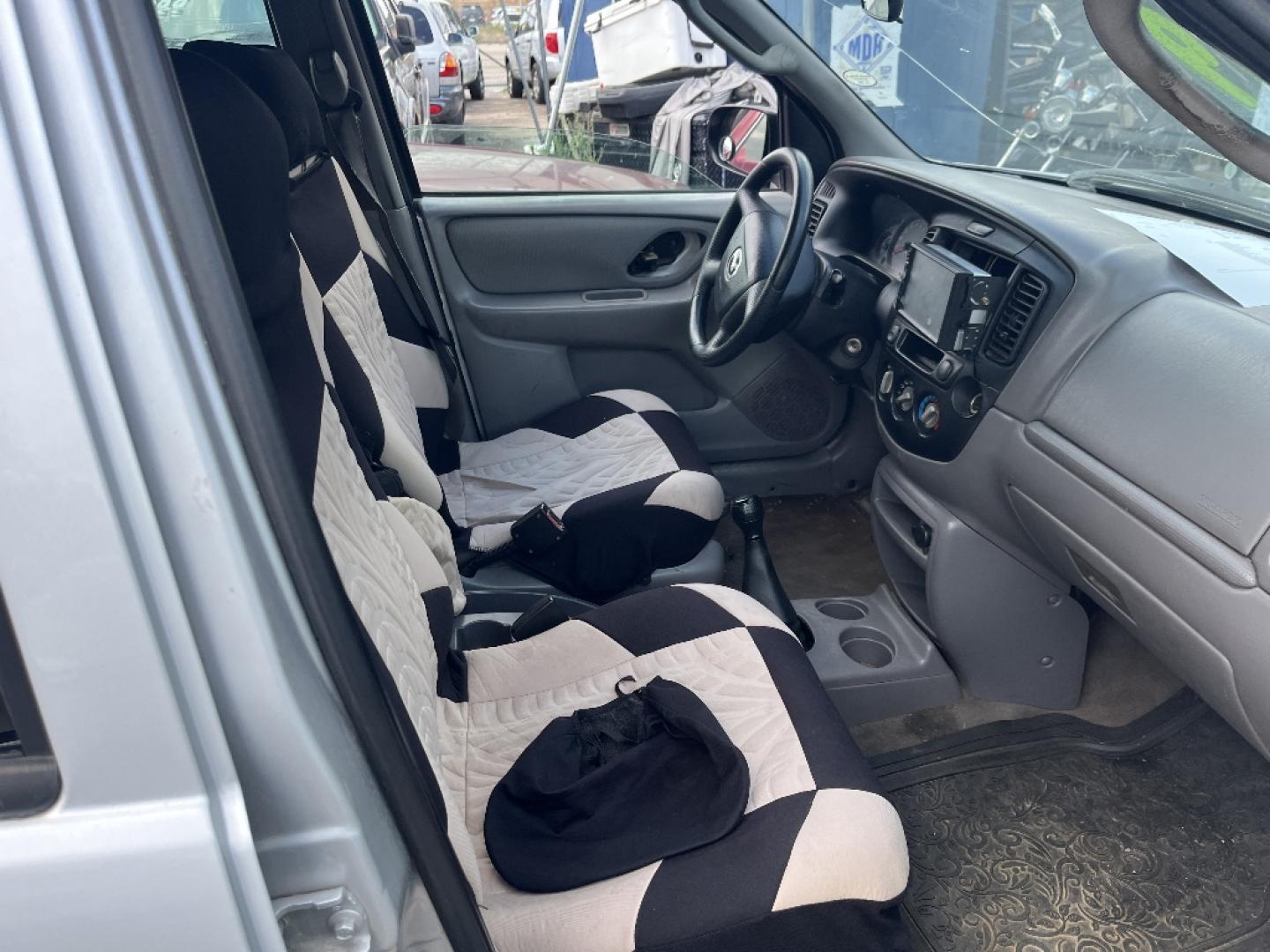 2001 BROWN MAZDA TRIBUTE DX (4F2YU07B11K) with an 2.0L L4 DOHC 16V engine, MANUAL transmission, located at 2303 West Mt. Houston, Houston, 77038, (281) 507-3956, 29.771597, -95.339569- Photo#1