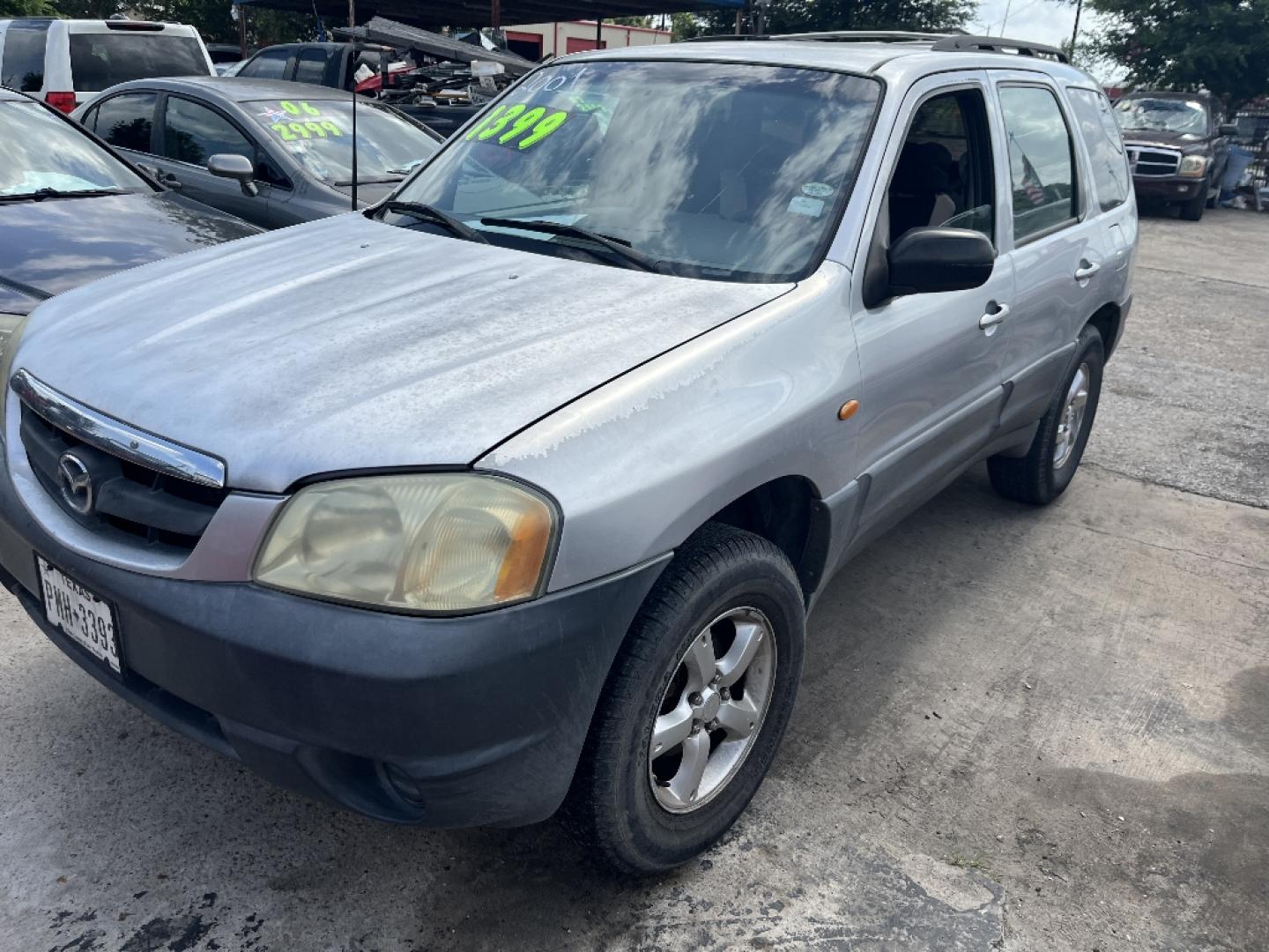 2001 BROWN MAZDA TRIBUTE DX (4F2YU07B11K) with an 2.0L L4 DOHC 16V engine, MANUAL transmission, located at 2303 West Mt. Houston, Houston, 77038, (281) 507-3956, 29.771597, -95.339569- Photo#3
