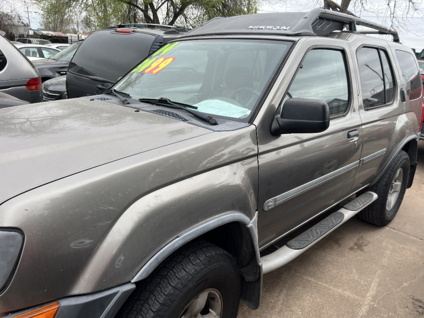 2004 BROWN NISSAN XTERRA XE 2WD (5N1ED28T94C) with an 3.3L V6 SOHC 12V engine, AUTOMATIC transmission, located at 2303 West Mt. Houston, Houston, 77038, (281) 507-3956, 29.771597, -95.339569- Photo#0