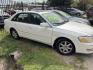 2001 WHITE TOYOTA AVALON XL (4T1BF28B51U) with an 3.0L V6 DOHC 24V engine, AUTOMATIC transmission, located at 2303 West Mt. Houston, Houston, 77038, (281) 507-3956, 29.771597, -95.339569- Photo#3