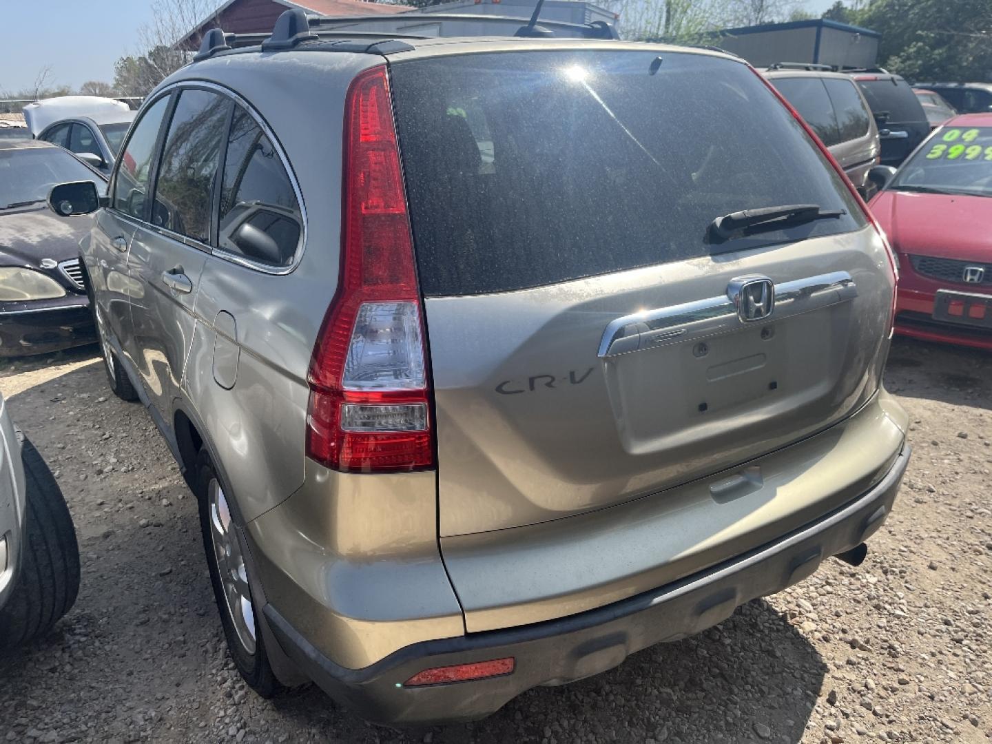2007 BROWN HONDA CR-V EX-L 2WD AT (JHLRE38707C) with an 2.4L L4 DOHC 16V engine, AUTOMATIC transmission, located at 2303 West Mt. Houston, Houston, 77038, (281) 507-3956, 29.771597, -95.339569- Photo#2
