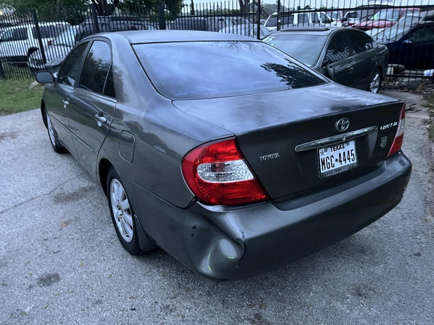 2002 GRAY TOYOTA CAMRY LE (4T1BE32K92U) with an 2.4L L4 DOHC 16V engine, AUTOMATIC transmission, located at 2303 West Mt. Houston, Houston, 77038, (281) 507-3956, 29.771597, -95.339569- Photo#1
