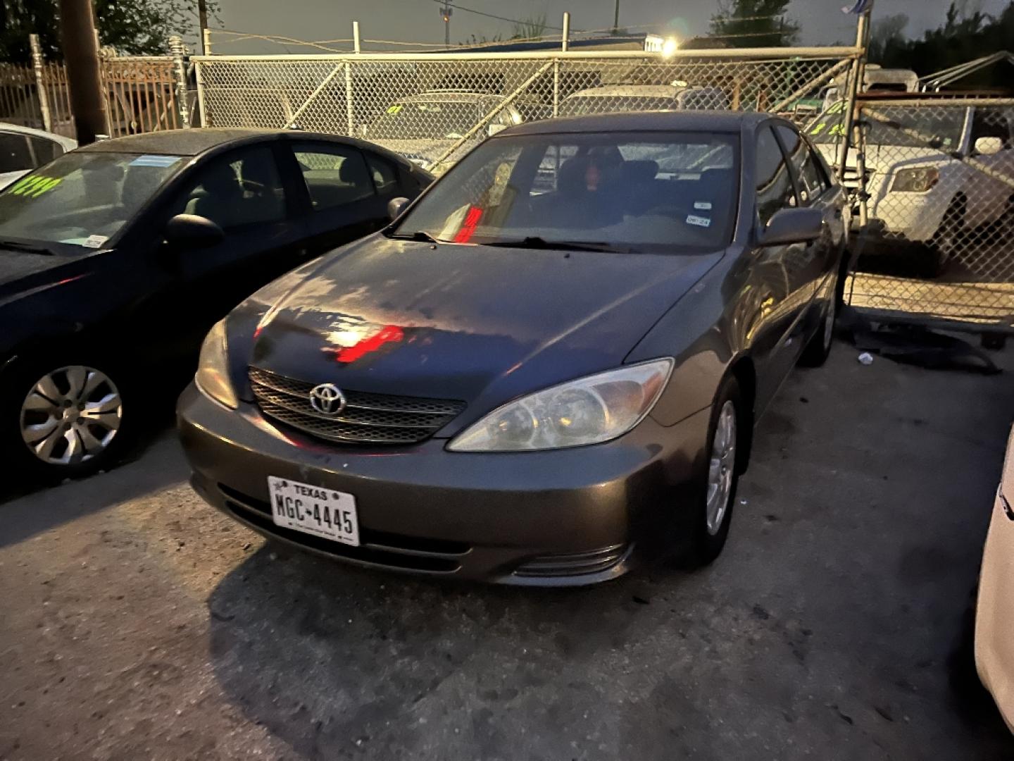 2002 GRAY TOYOTA CAMRY LE (4T1BE32K92U) with an 2.4L L4 DOHC 16V engine, AUTOMATIC transmission, located at 2303 West Mt. Houston, Houston, 77038, (281) 507-3956, 29.771597, -95.339569- Photo#4
