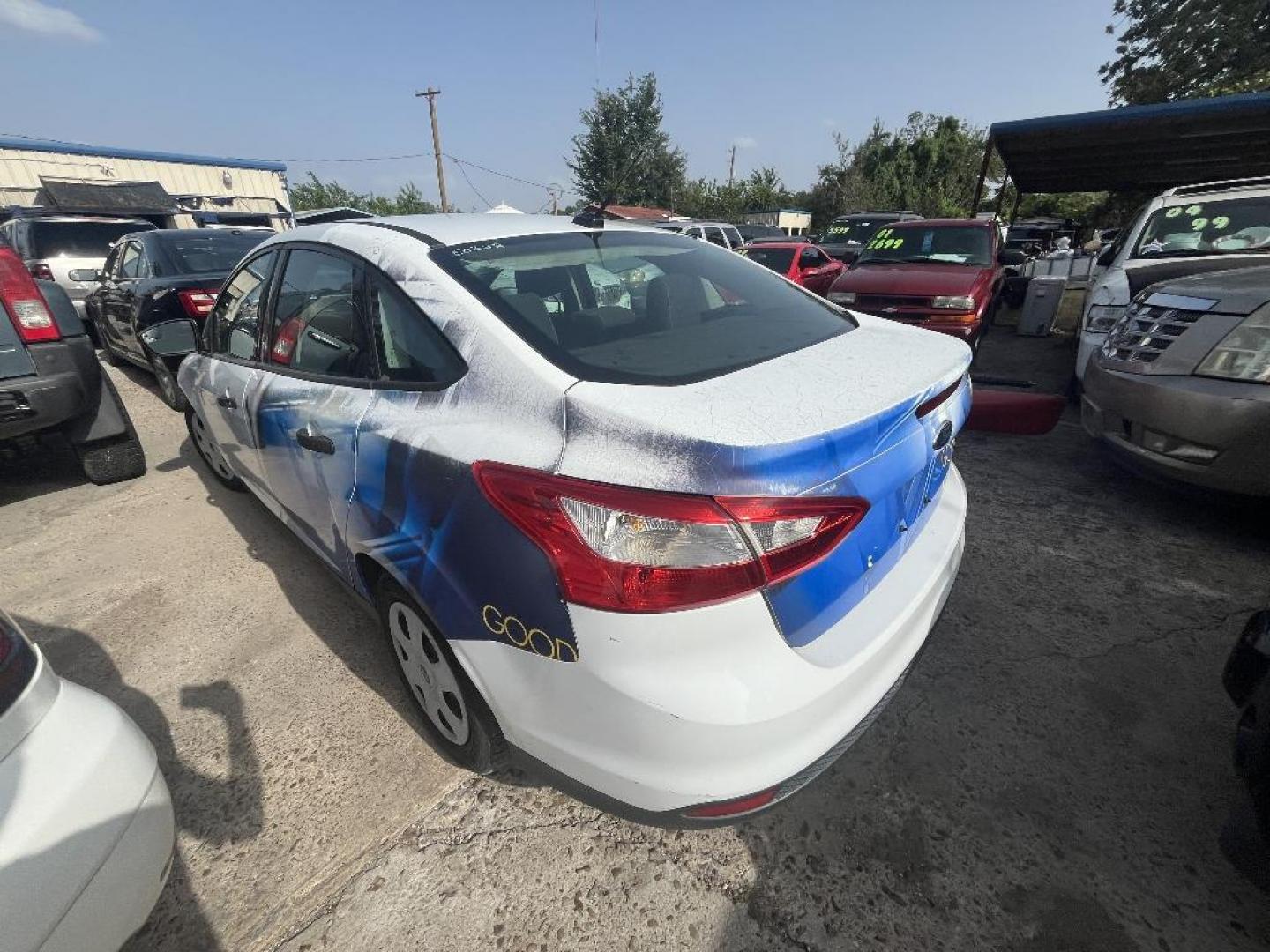 2013 WHITE FORD FOCUS S Sedan (1FADP3E27DL) with an 2.0L L4 DOHC 16V engine, AUTOMATIC transmission, located at 2303 West Mt. Houston, Houston, 77038, (281) 507-3956, 29.771597, -95.339569 - Photo#1