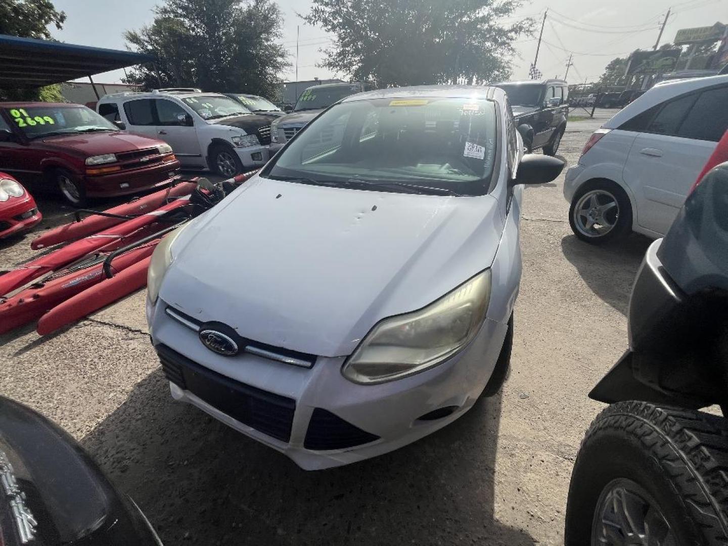 2013 WHITE FORD FOCUS S Sedan (1FADP3E27DL) with an 2.0L L4 DOHC 16V engine, AUTOMATIC transmission, located at 2303 West Mt. Houston, Houston, 77038, (281) 507-3956, 29.771597, -95.339569 - Photo#2