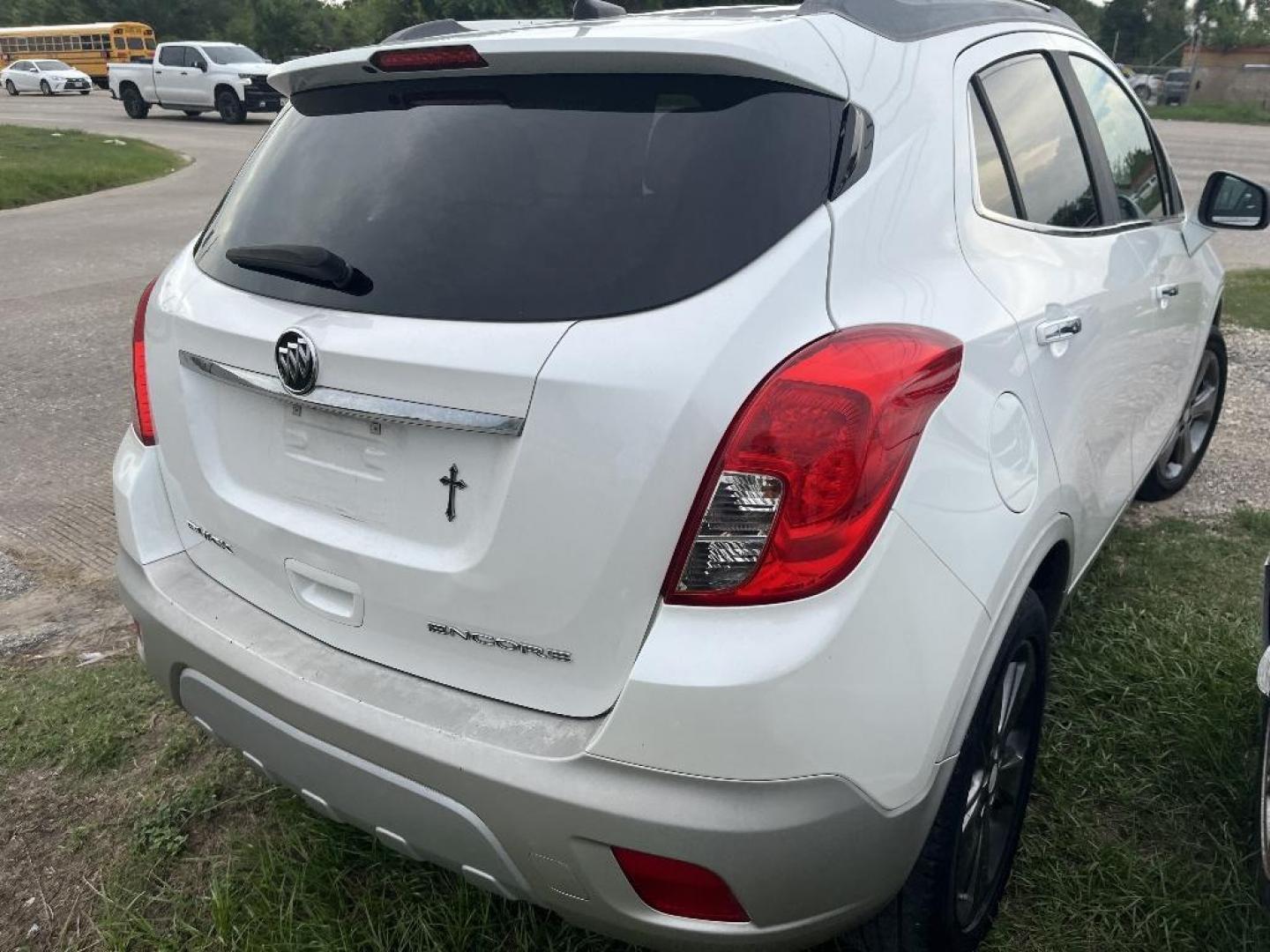 2013 WHITE BUICK ENCORE Convenience FWD (KL4CJBSB0DB) with an 1.4L L4 DOHC 16V TURBO engine, AUTOMATIC transmission, located at 2303 West Mt. Houston, Houston, 77038, (281) 507-3956, 29.771597, -95.339569 - Photo#1