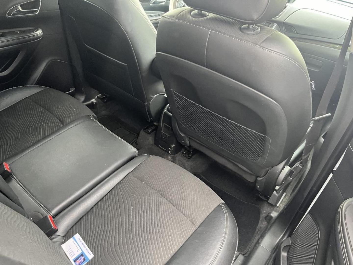2013 WHITE BUICK ENCORE Convenience FWD (KL4CJBSB0DB) with an 1.4L L4 DOHC 16V TURBO engine, AUTOMATIC transmission, located at 2303 West Mt. Houston, Houston, 77038, (281) 507-3956, 29.771597, -95.339569 - Photo#5