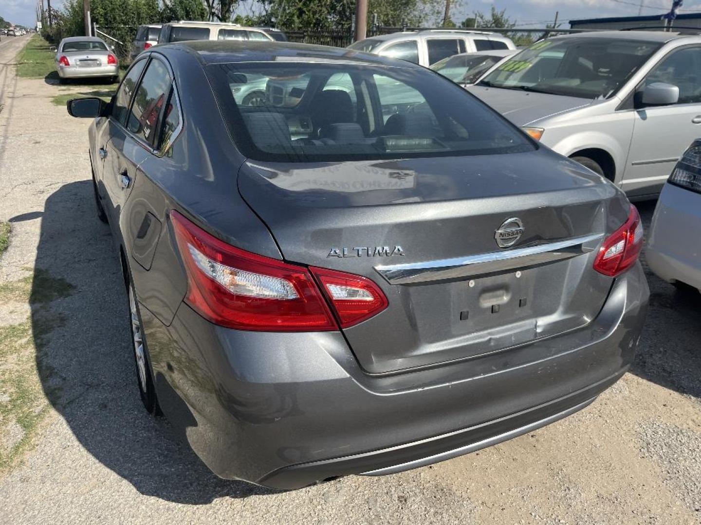 2016 GRAY NISSAN ALTIMA 2.5 S (1N4AL3AP9GC) with an 2.5L L4 DOHC 16V engine, AUTOMATIC transmission, located at 2303 West Mt. Houston, Houston, 77038, (281) 507-3956, 29.771597, -95.339569 - Photo#2
