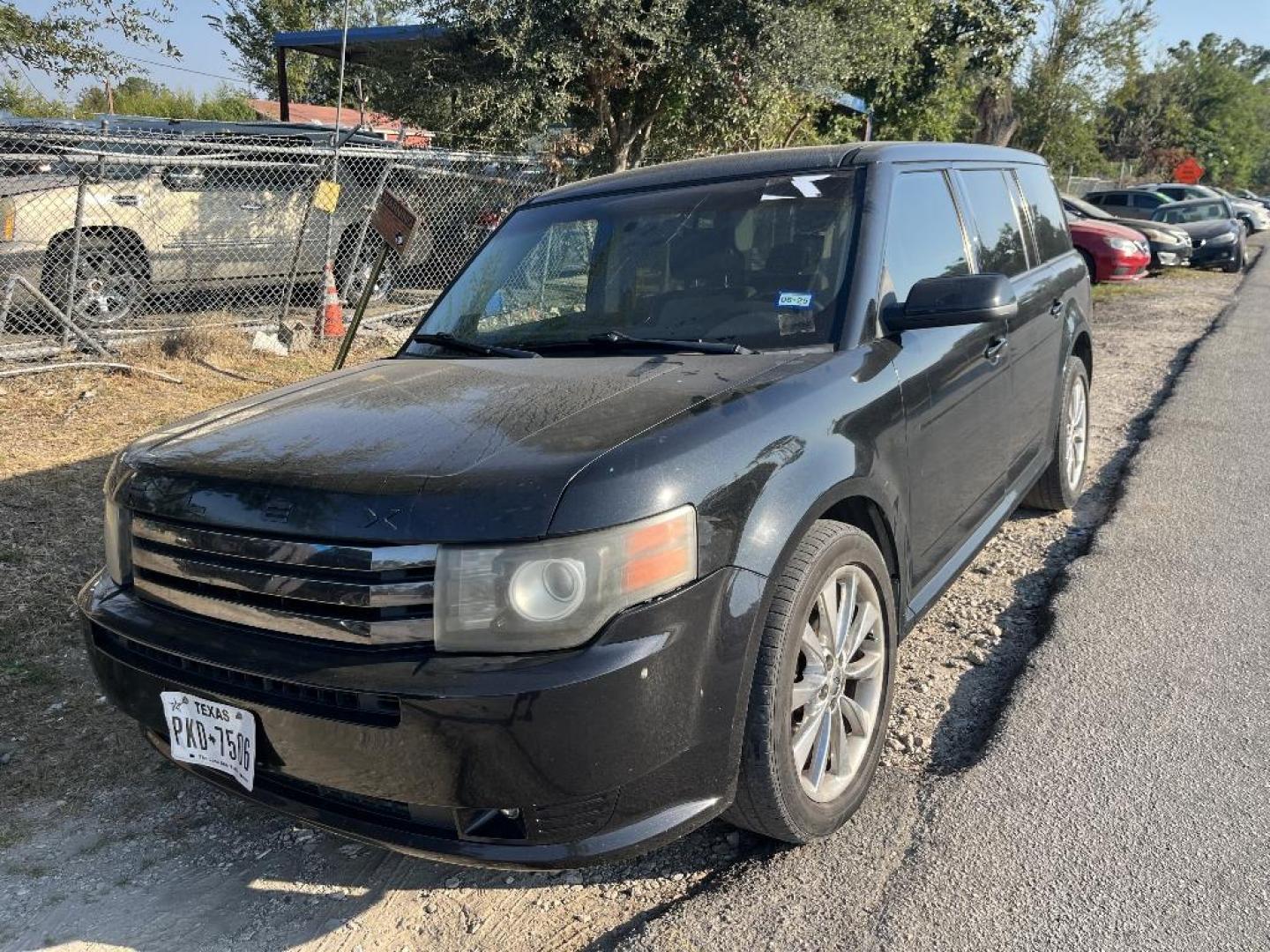 2011 BLACK FORD FLEX Limited FWD (2FMGK5DC8BB) with an 3.5L V6 DOHC 24V engine, AUTOMATIC transmission, located at 2303 West Mt. Houston, Houston, 77038, (281) 507-3956, 29.771597, -95.339569 - Photo#0
