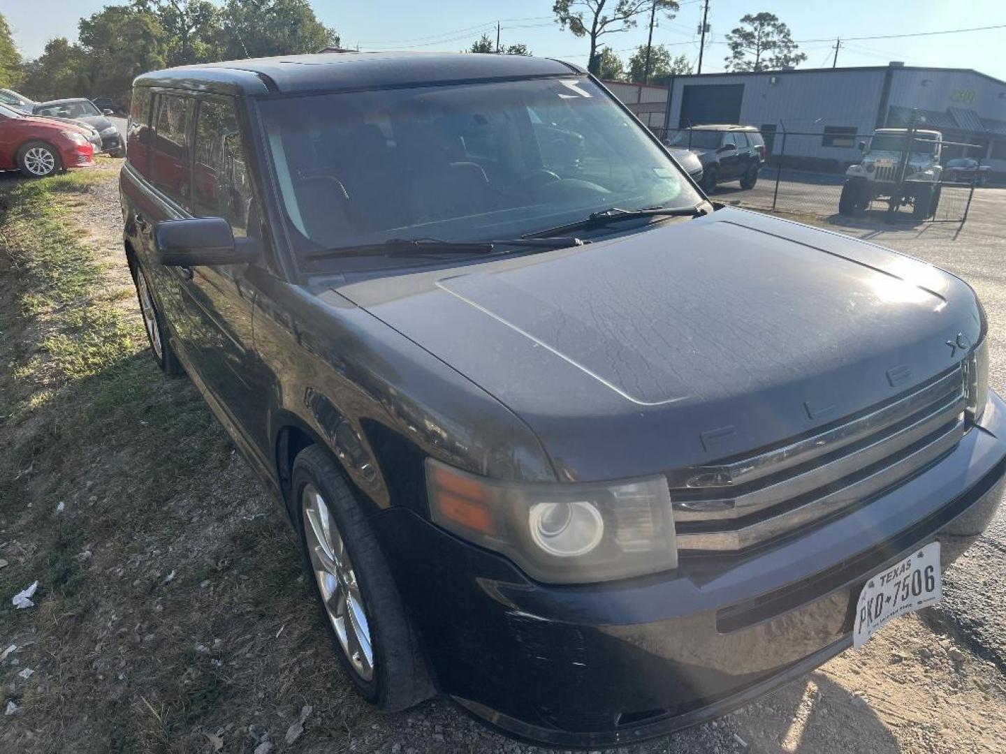 2011 BLACK FORD FLEX Limited FWD (2FMGK5DC8BB) with an 3.5L V6 DOHC 24V engine, AUTOMATIC transmission, located at 2303 West Mt. Houston, Houston, 77038, (281) 507-3956, 29.771597, -95.339569 - Photo#1