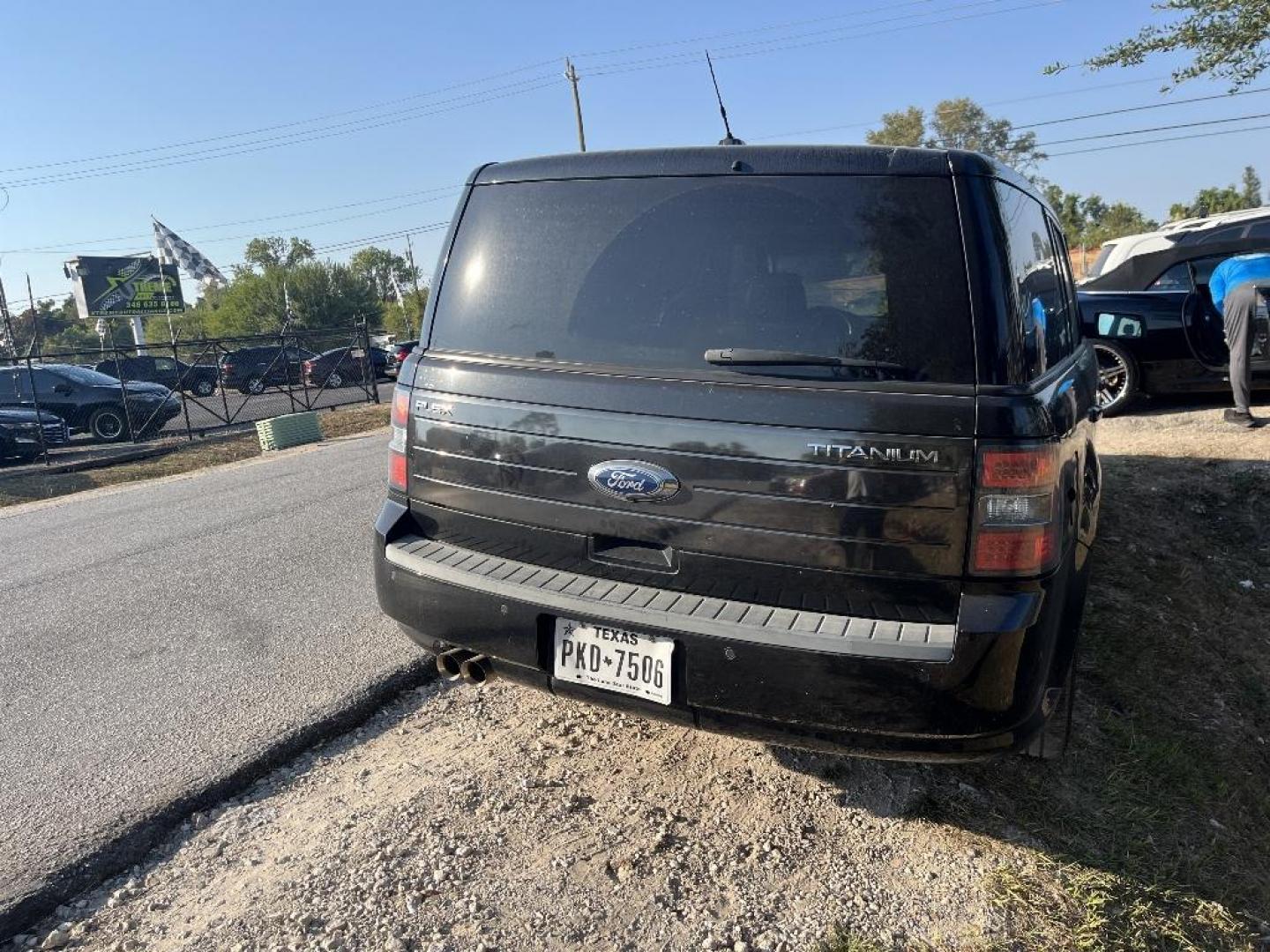 2011 BLACK FORD FLEX Limited FWD (2FMGK5DC8BB) with an 3.5L V6 DOHC 24V engine, AUTOMATIC transmission, located at 2303 West Mt. Houston, Houston, 77038, (281) 507-3956, 29.771597, -95.339569 - Photo#3